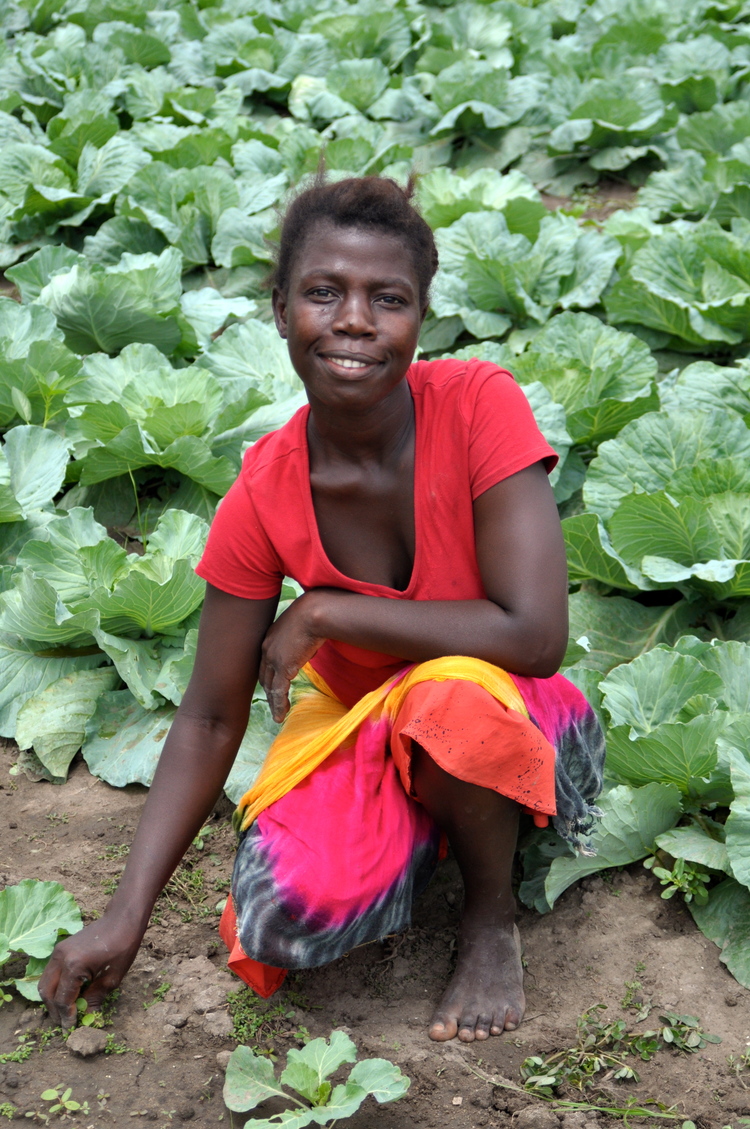 one of the farming students with cabbages.jpg