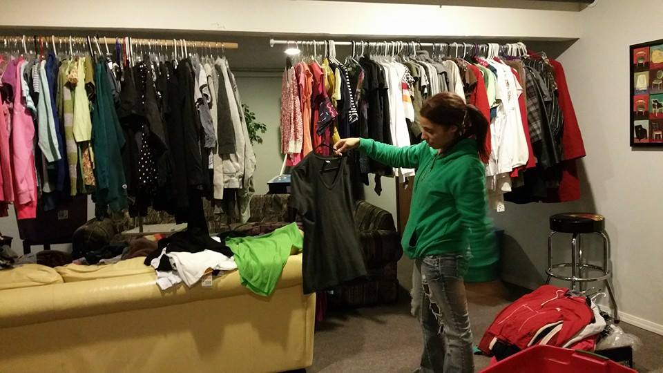 volunteer hanging clothes.jpg