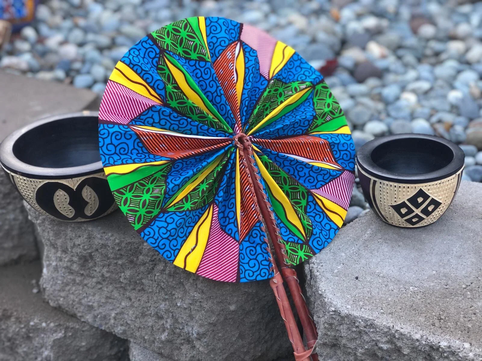 fan and wooden bowls.jpeg