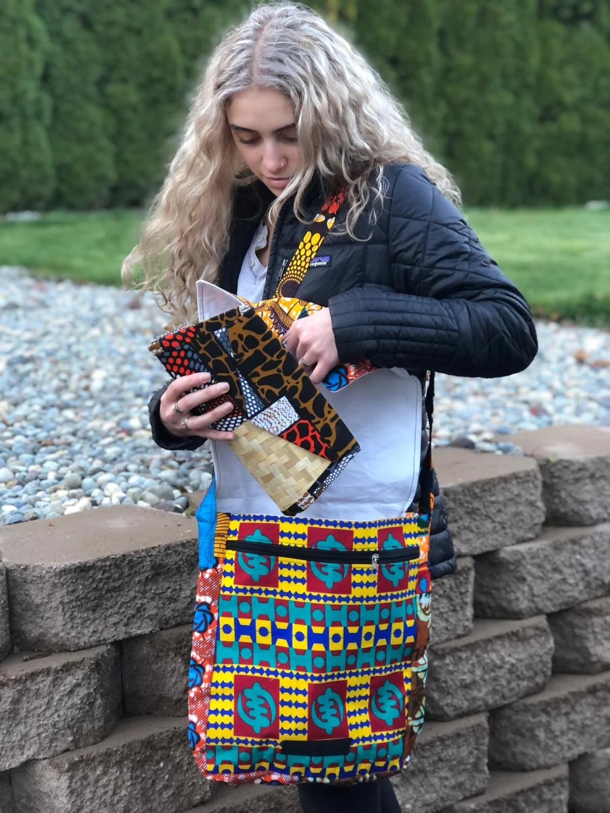 Hannah with batik bag open.jpeg