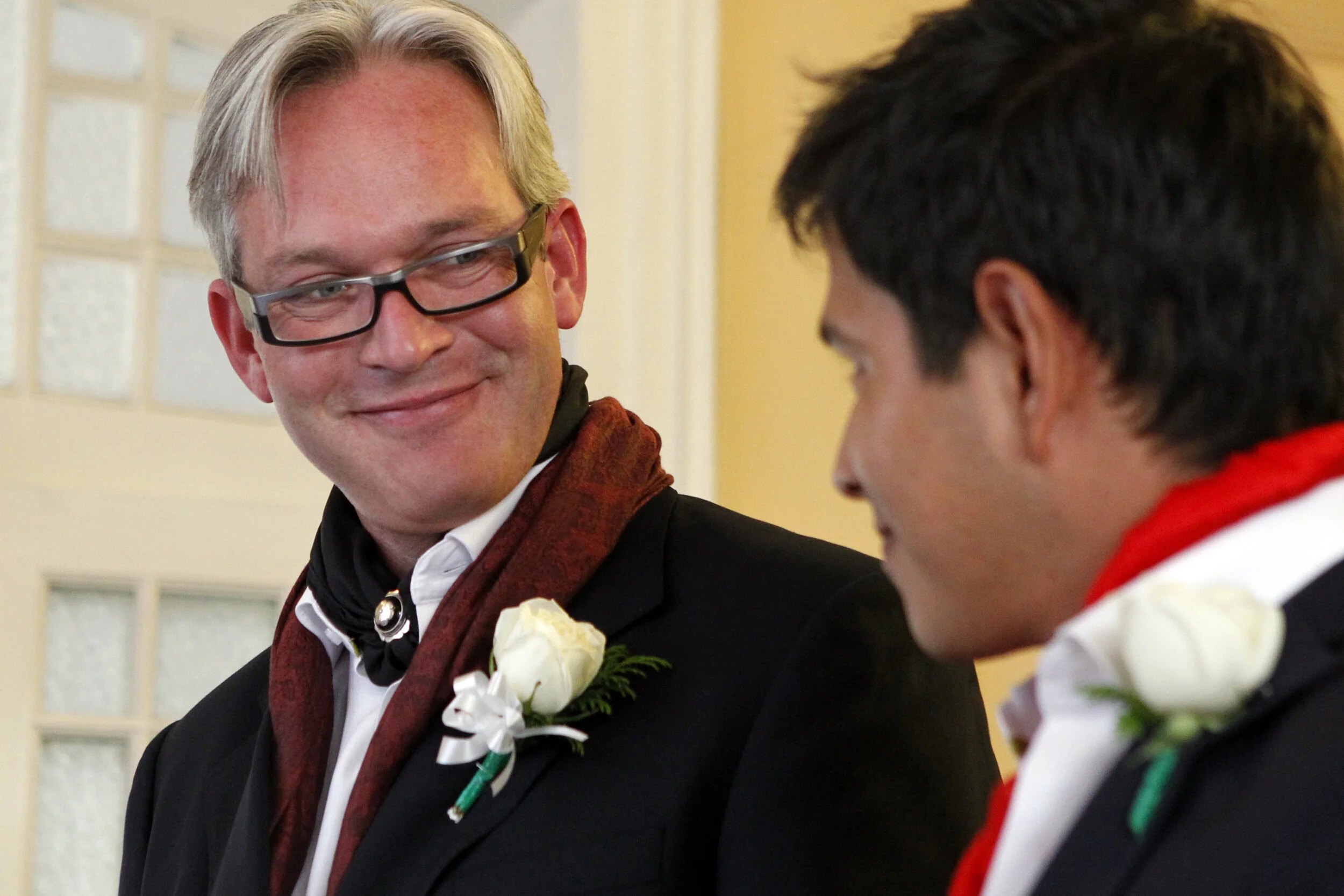  Patrick Dove/Standard-TimesJ.W. Lown gives a smile to his same-sex partner as they stand before the judge at their Wedding in November at the Hotel Casa Gonzalez in Mexico City. Lown gave up his fourth term as the mayor of San Angelo to move to Mexi
