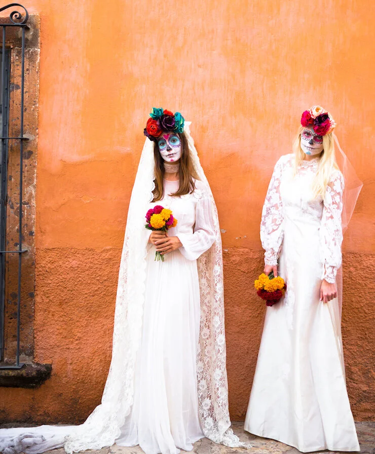 brides-on-the-orange-wall.jpg