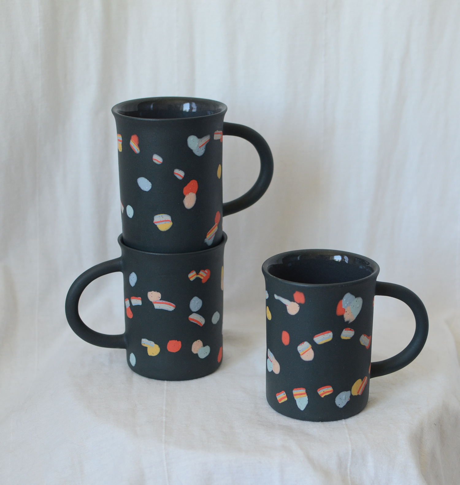 Black rainbow nerikomi mug