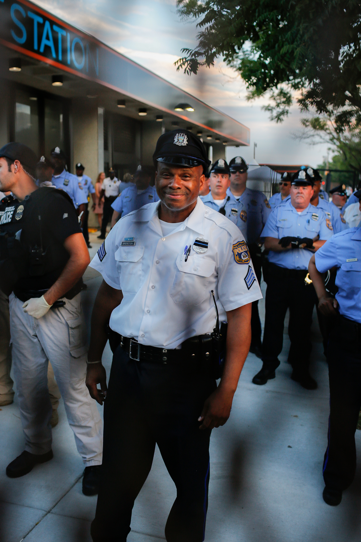 Philly Police Officer Smiling Through the Barricade