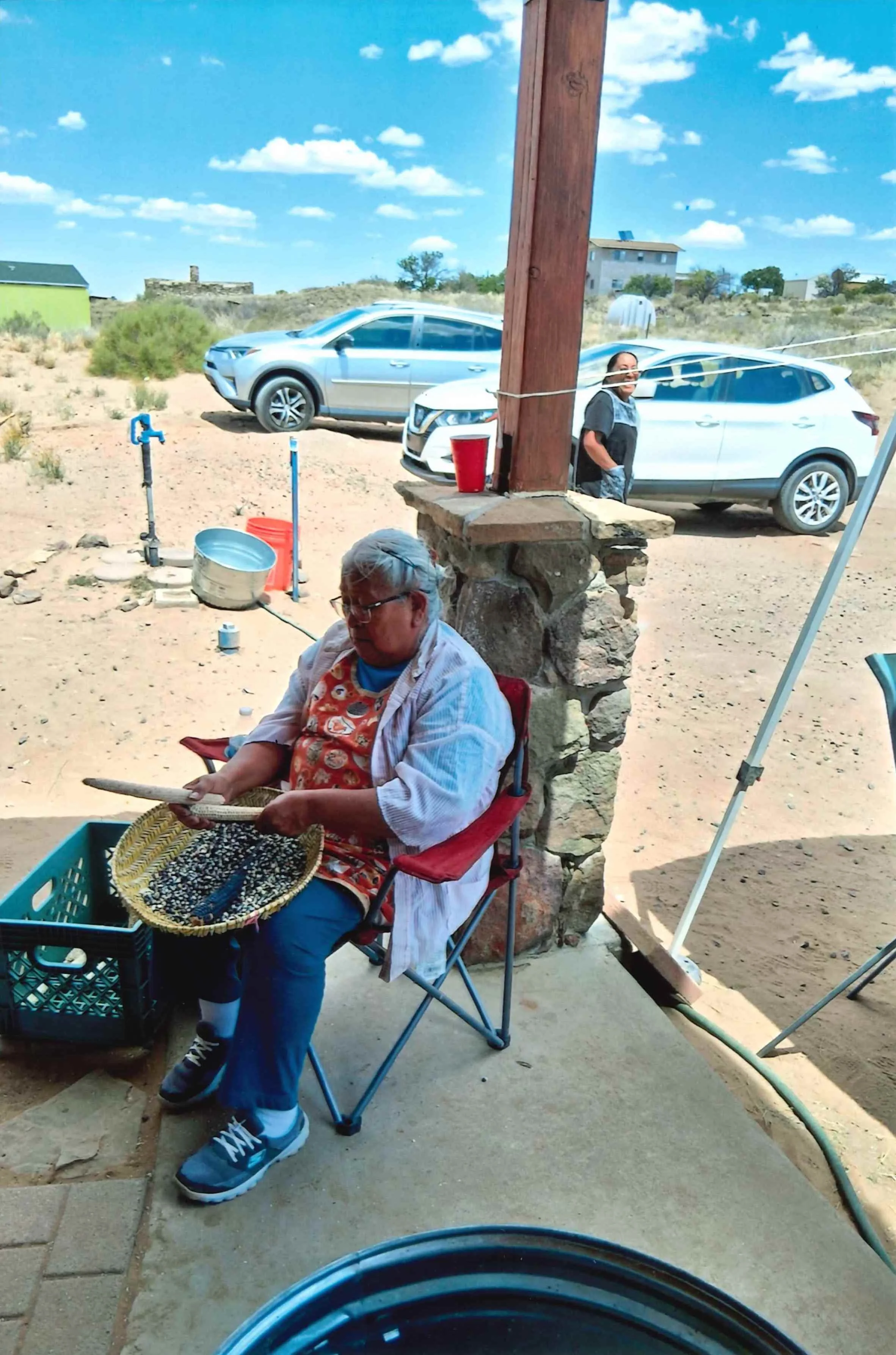 Photo2_Elder Wilmitta at Hotevilla shelling corn.jpeg