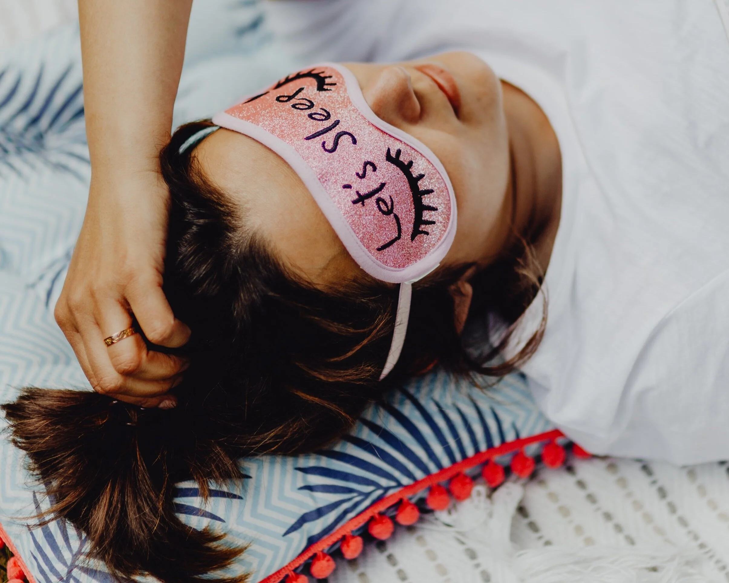 kaboompics_Joyful+girl+relaxing+in+bedroom+-+top+view+of+brunette+women+in+pink+sleeping+mask+%281%29+%281%29.jpg