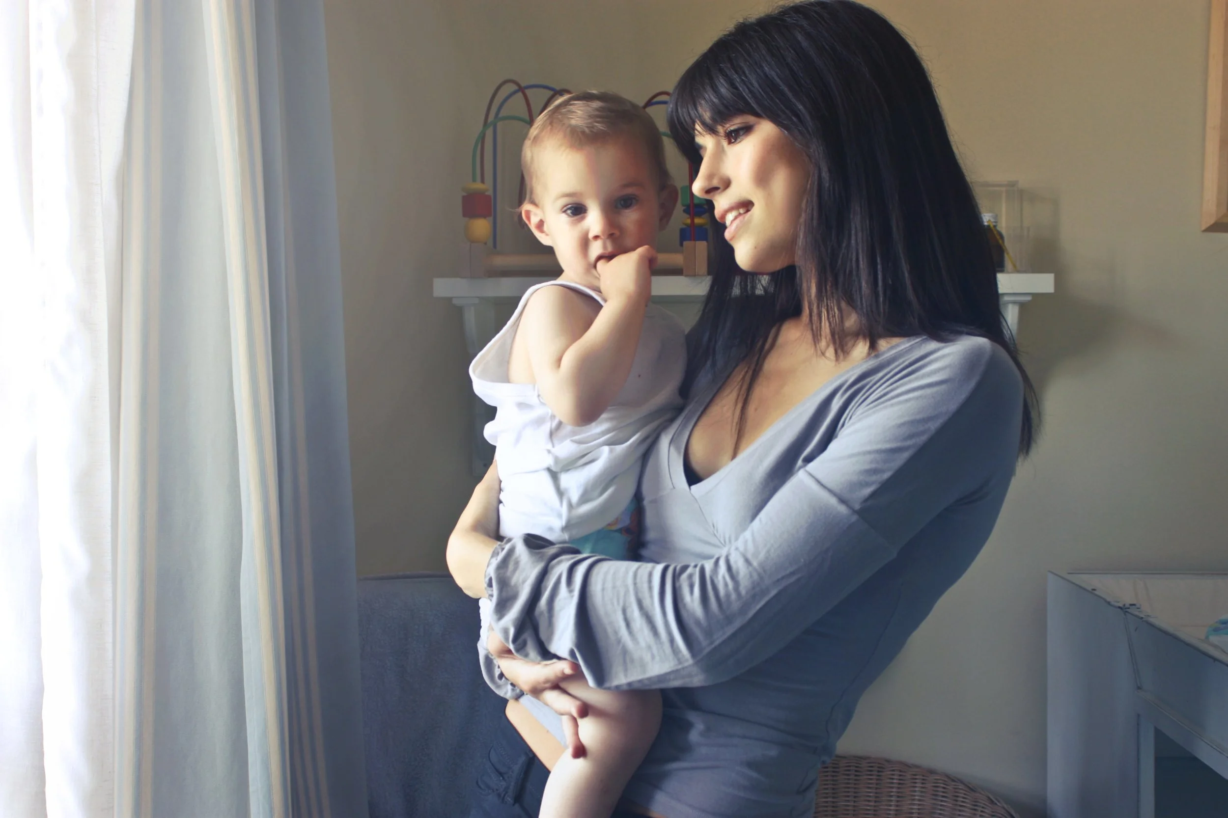 mother-child-looking-out-window.jpg