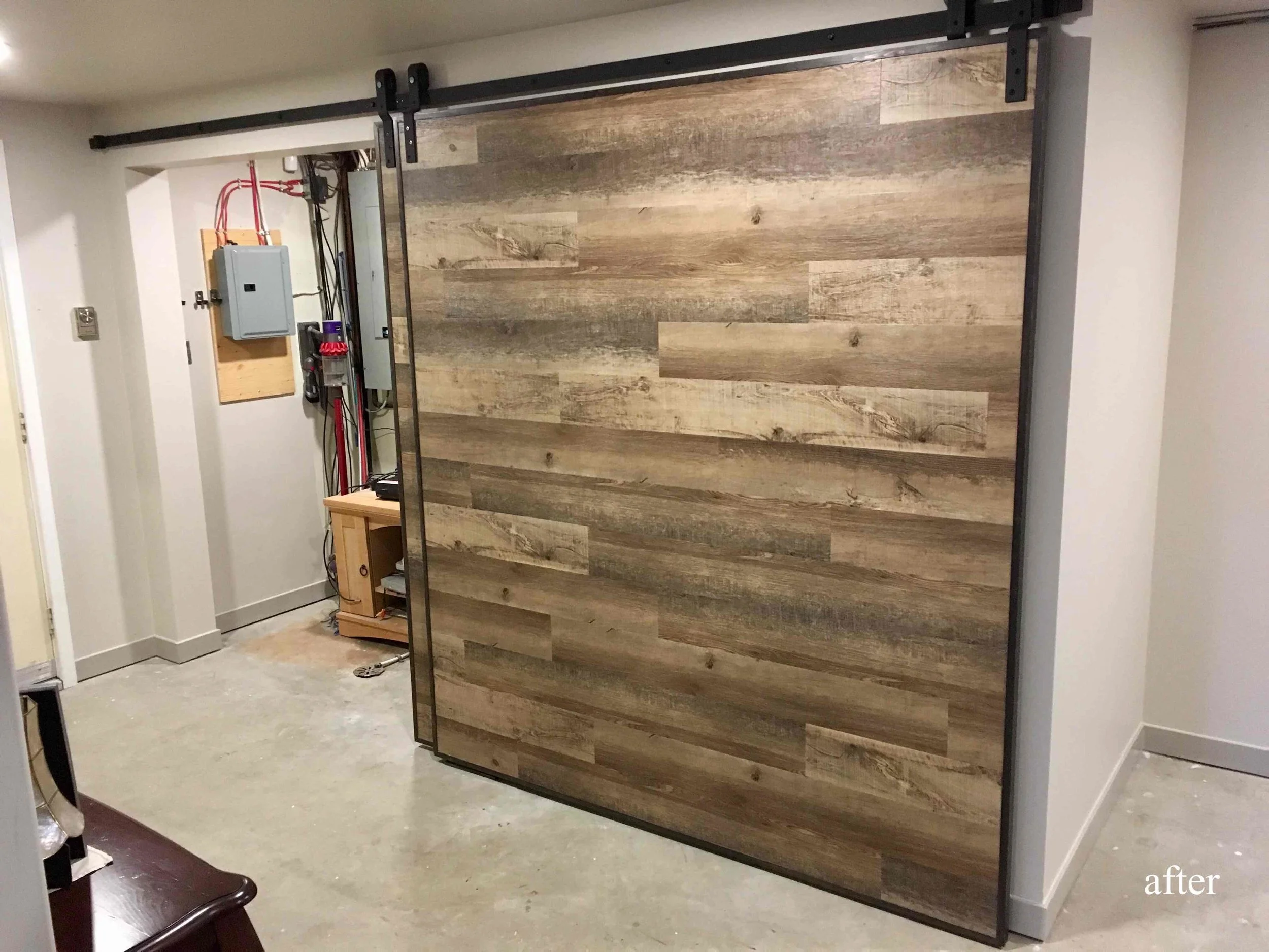 Custom barn doors to hide a basement storage area in the East Kootenays.