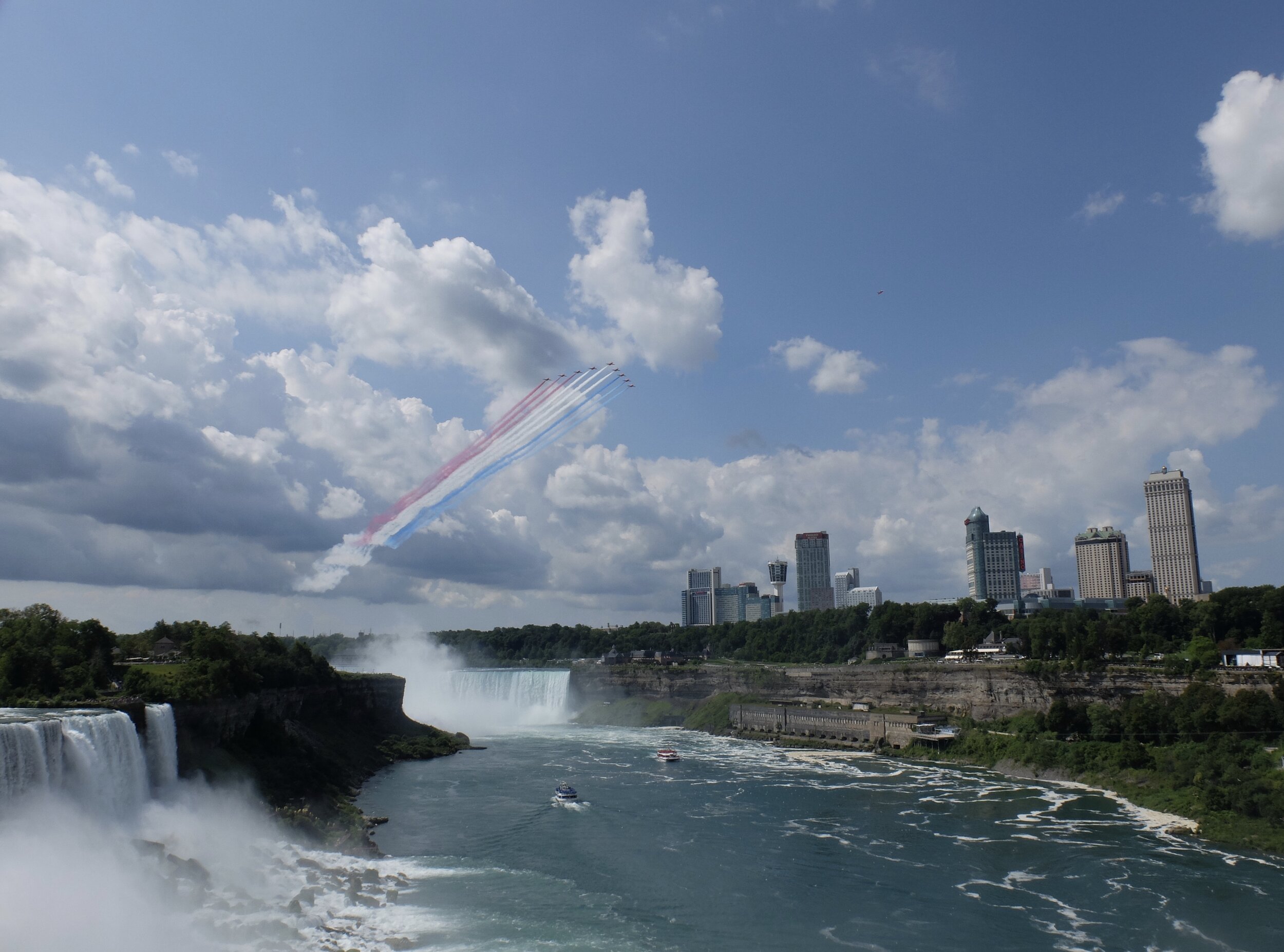 We were on the observation platform when we noticed this spectacle appearing.  It was the British RAF Red Arrows 2019 North American Tour.