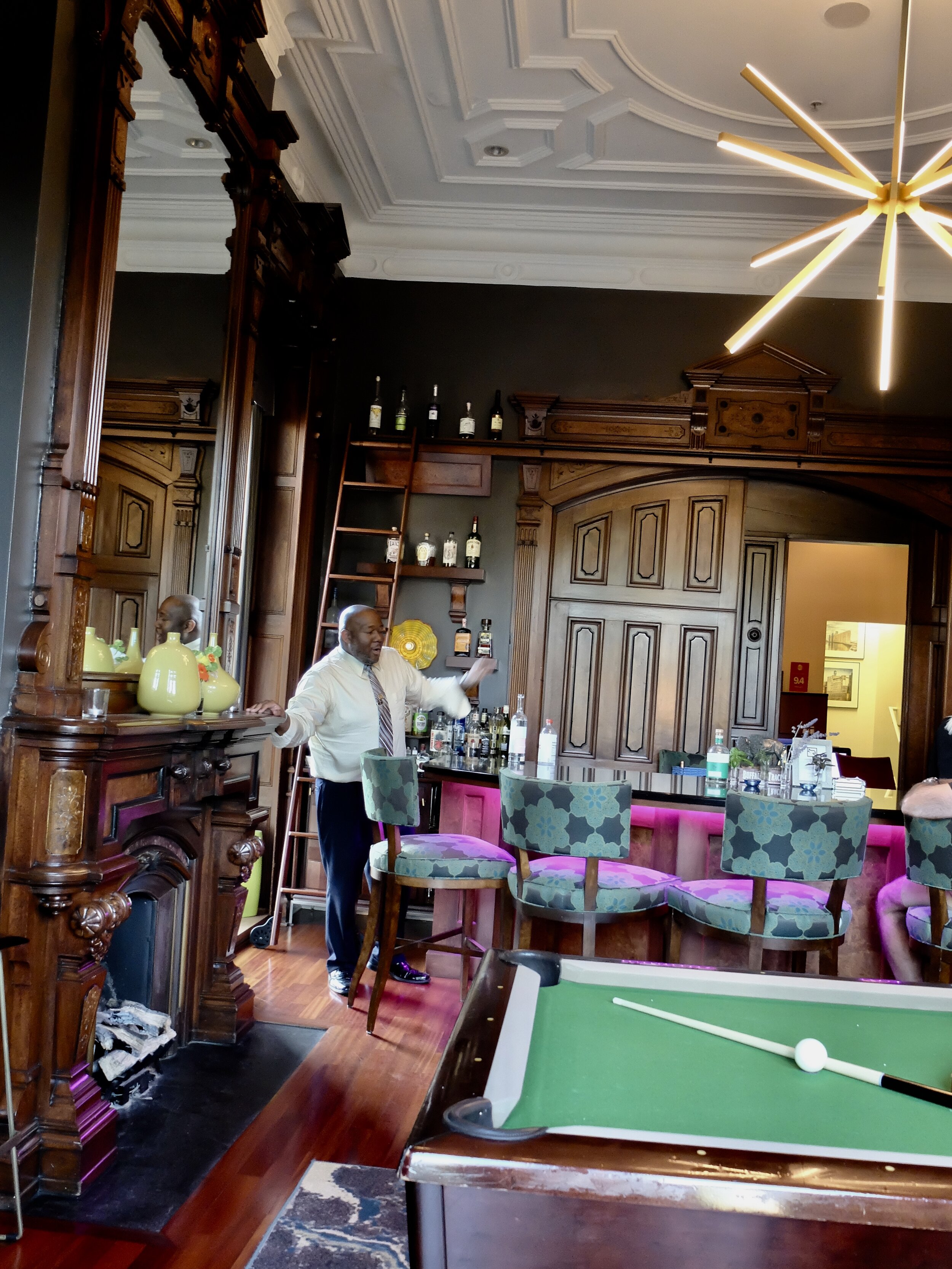The front desk manager, Jevon, enjoyed filling us in on the history of the Mansion &amp; facts about Buffalo.  After the break, I got off a few bank shots on that pool table.