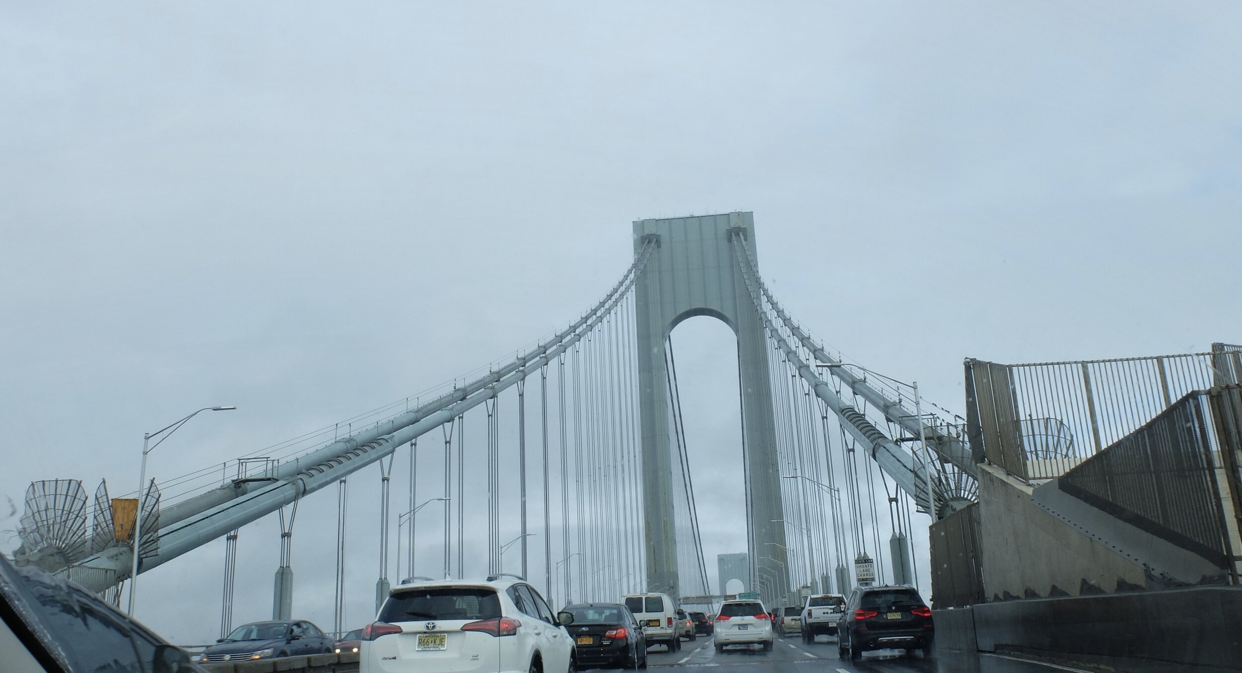 Verrazzano-Narrows Bridge, formerly spelled Verrazano, spanning New York Harbor from Brooklyn to Staten Island, built by Othmar H. Ammann from 1959 to 1964.