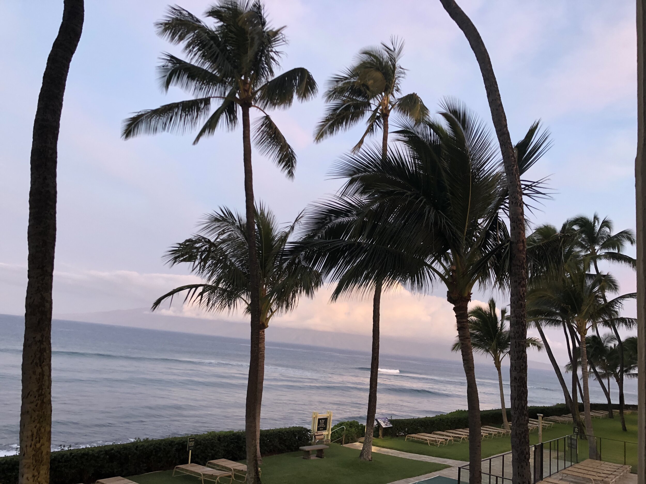 Sunrise from our 2nd floor porch, ʻōpala, at Aston Mahana Condos/Resort. Ka'anapali, Maui, HI