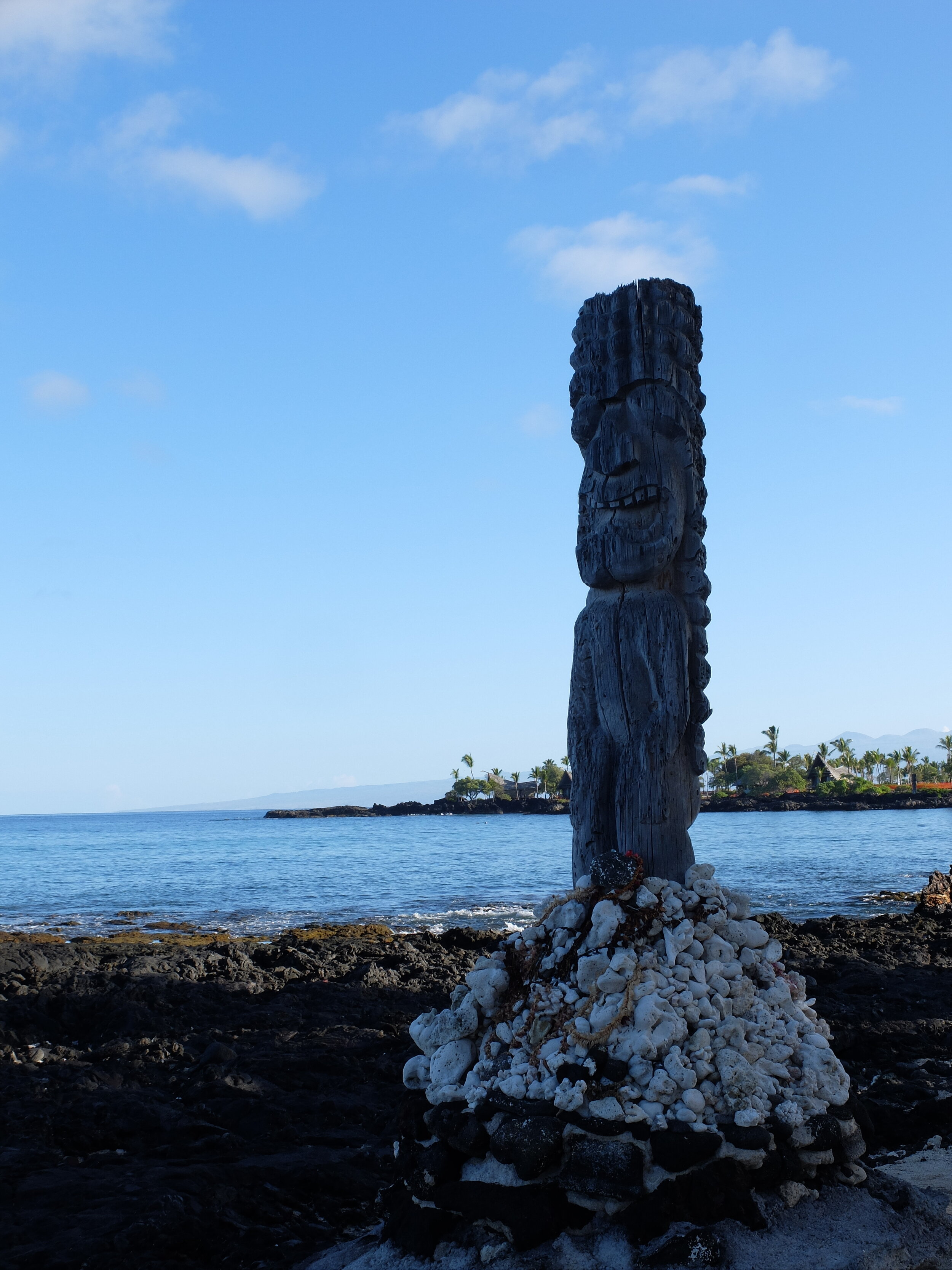 In the background, Kona Village Resort that is being rebuit. It sustained damage to the property from a 2011 earthquake-generated tsunami that was severe enough to render it inoperable. 