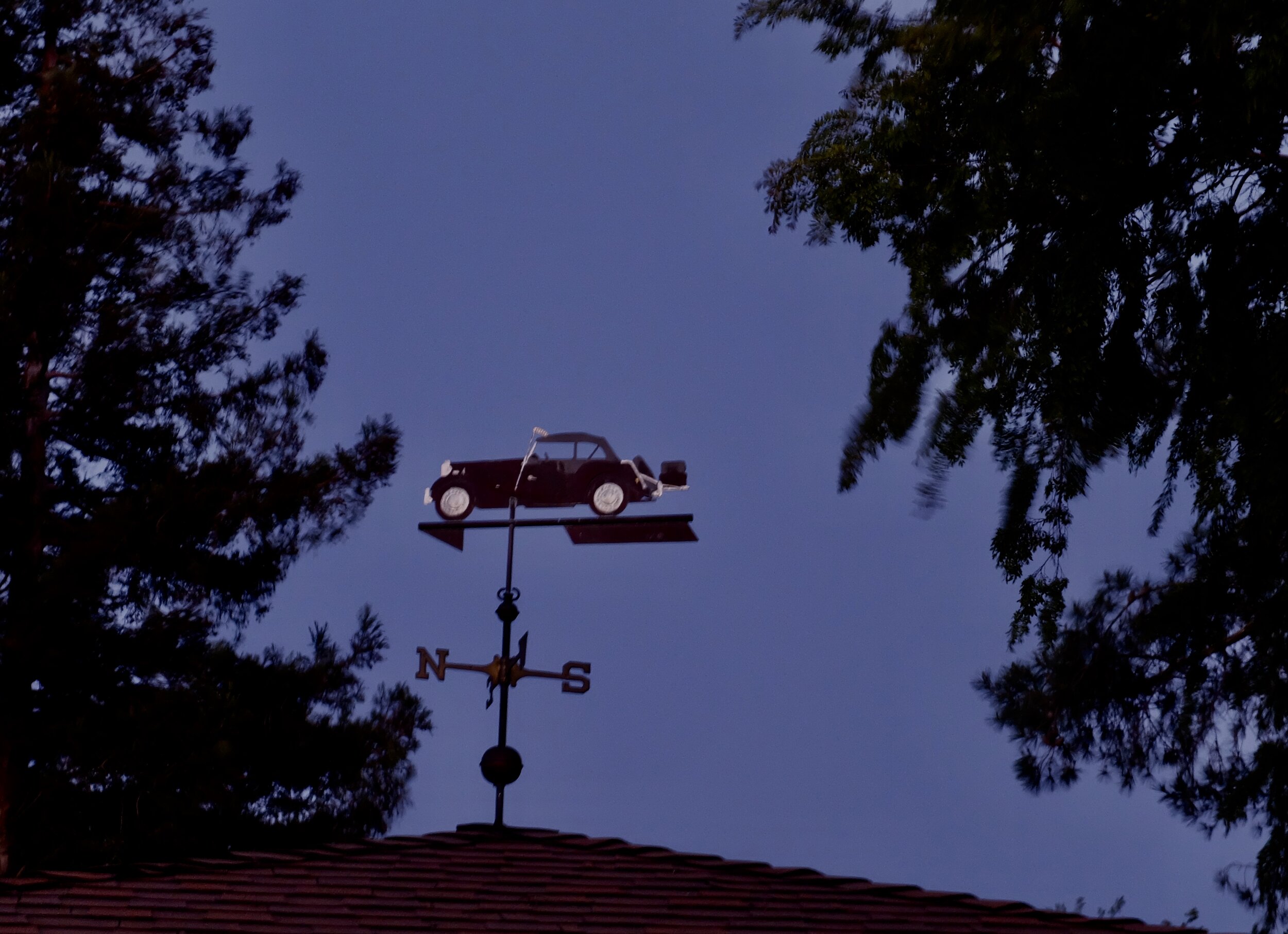 Sunset, right before the full moon appeared behind the MG TD weathervane.