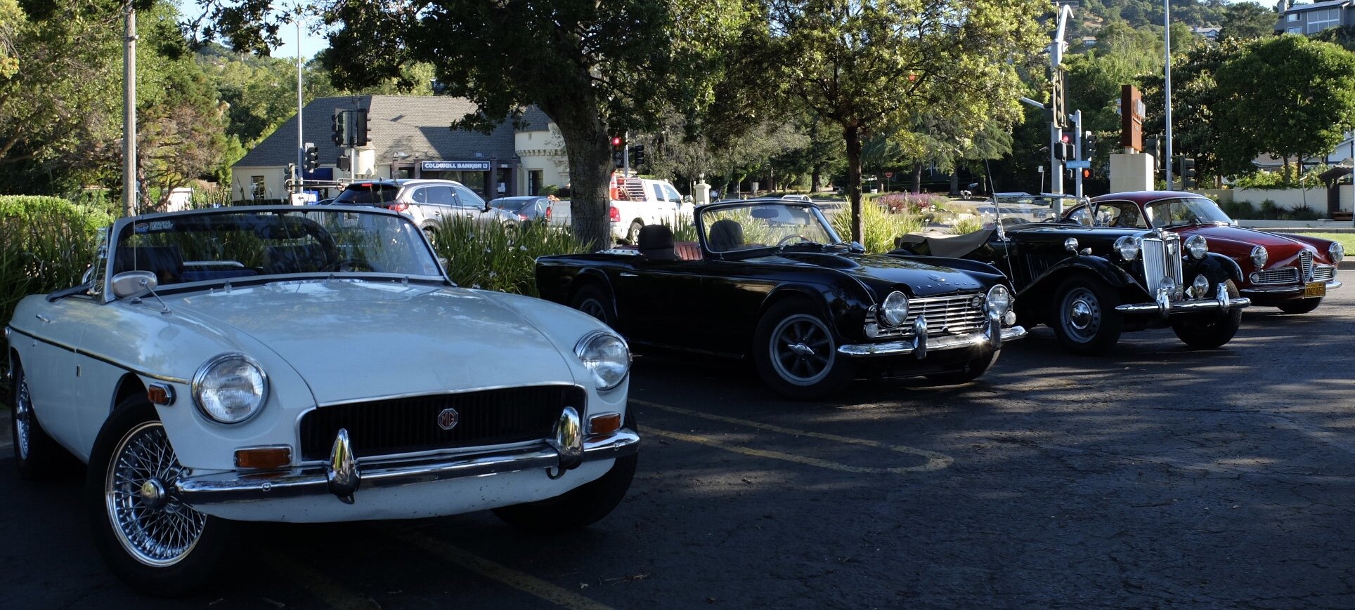 Four vintage cars gathered to drive around West Marin.