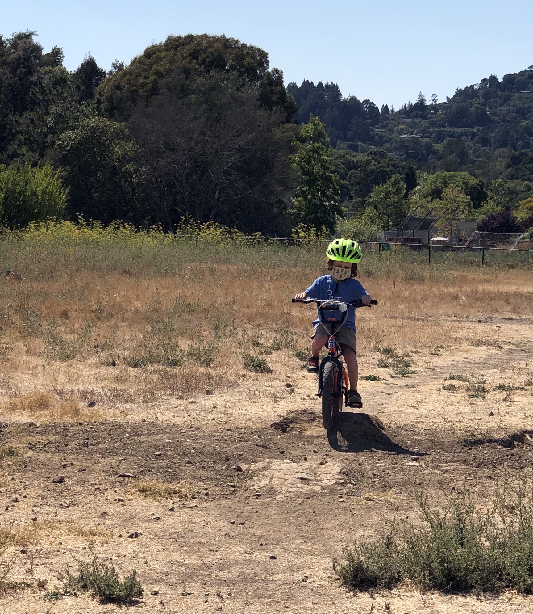 Learning to ride on dirt.