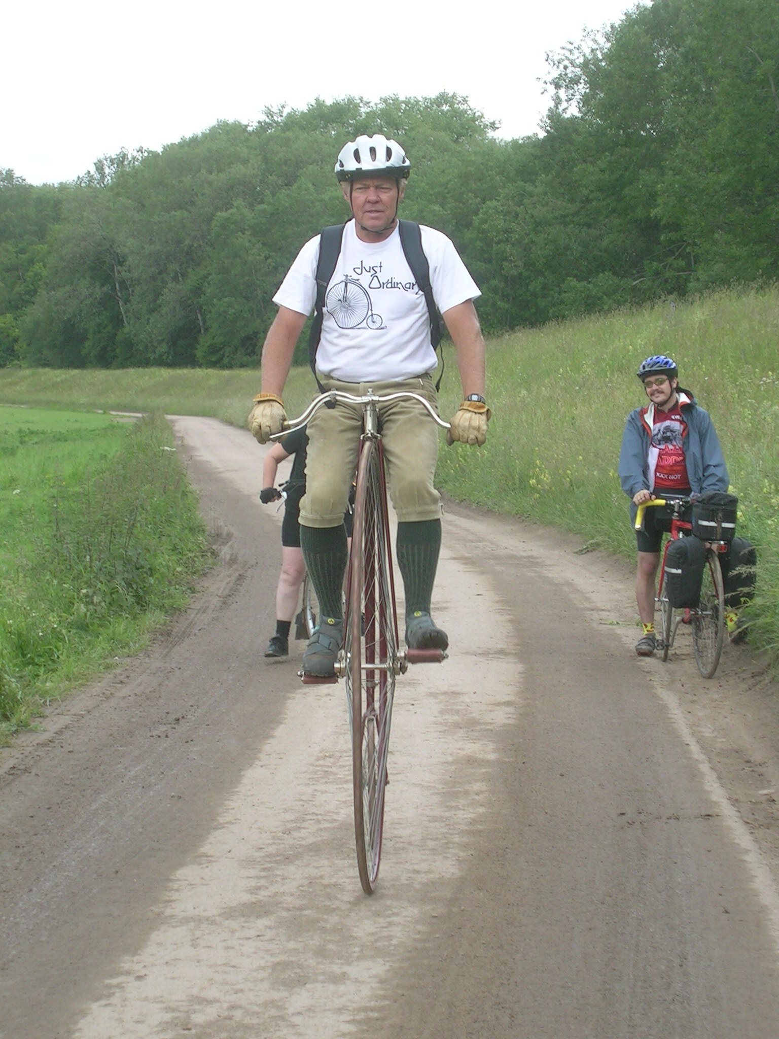 On a bike path along the Rhine River in Germany. This  guy &amp; pals had ridden Ordinarys from England.  He doesn't look too happy but then he had just gotten up on the Ordinary; not an easy feat.