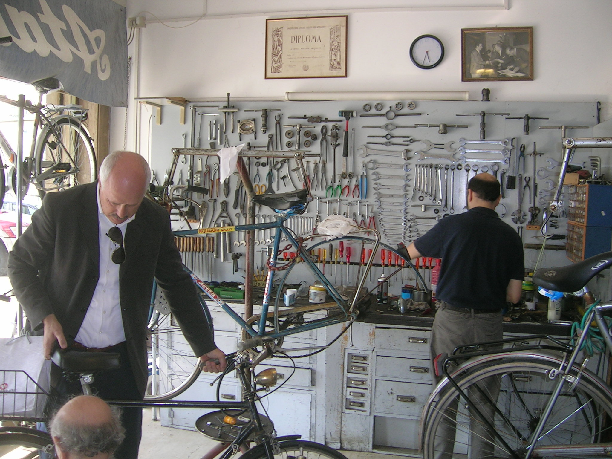 Lido di Venezia, The Lido. The shop owner probably made those bike stands as a project in school while earning that diploma