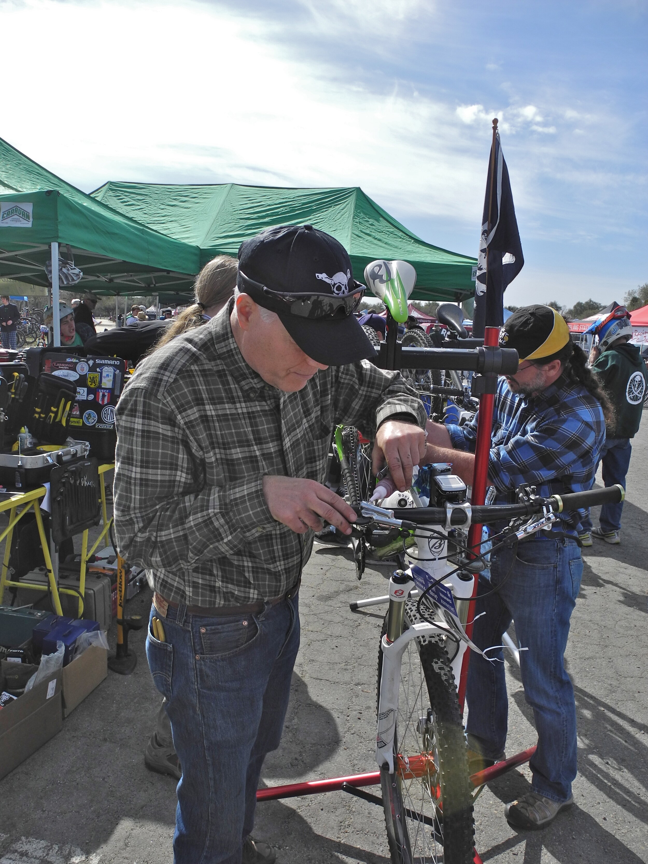   Pop up bicycle repair shops  appear as needed, like at this one for the Drake H.S.team at a NorCal high school bicycle race in Granite Bay. 