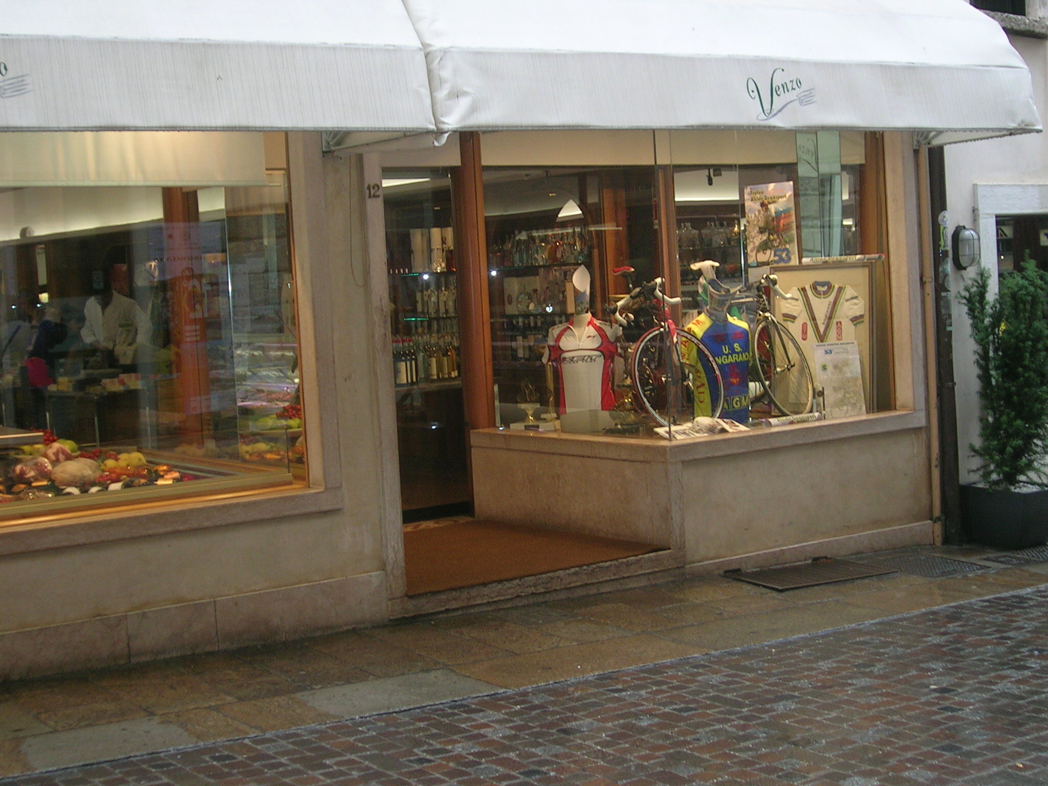 Not a bike shop but a food delicacies shop in Bassano del Grappa, Italy.  The owner had been a bike racer.