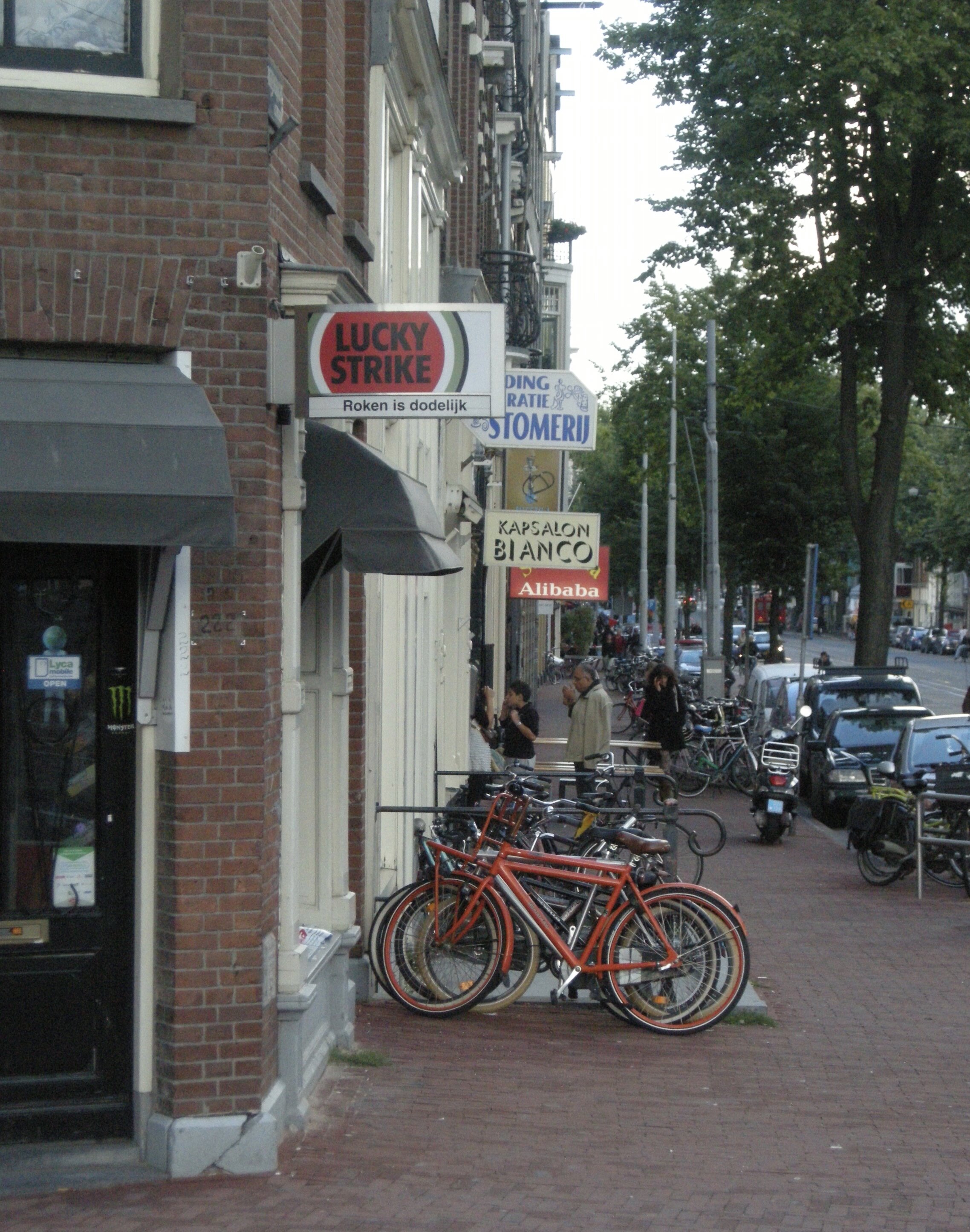 In Holland, a lot of bikes in front of a shop does not always mean there's a bike shop.  There are just a lot of bikes around.  I noticed the same thing happening in Brooklyn.