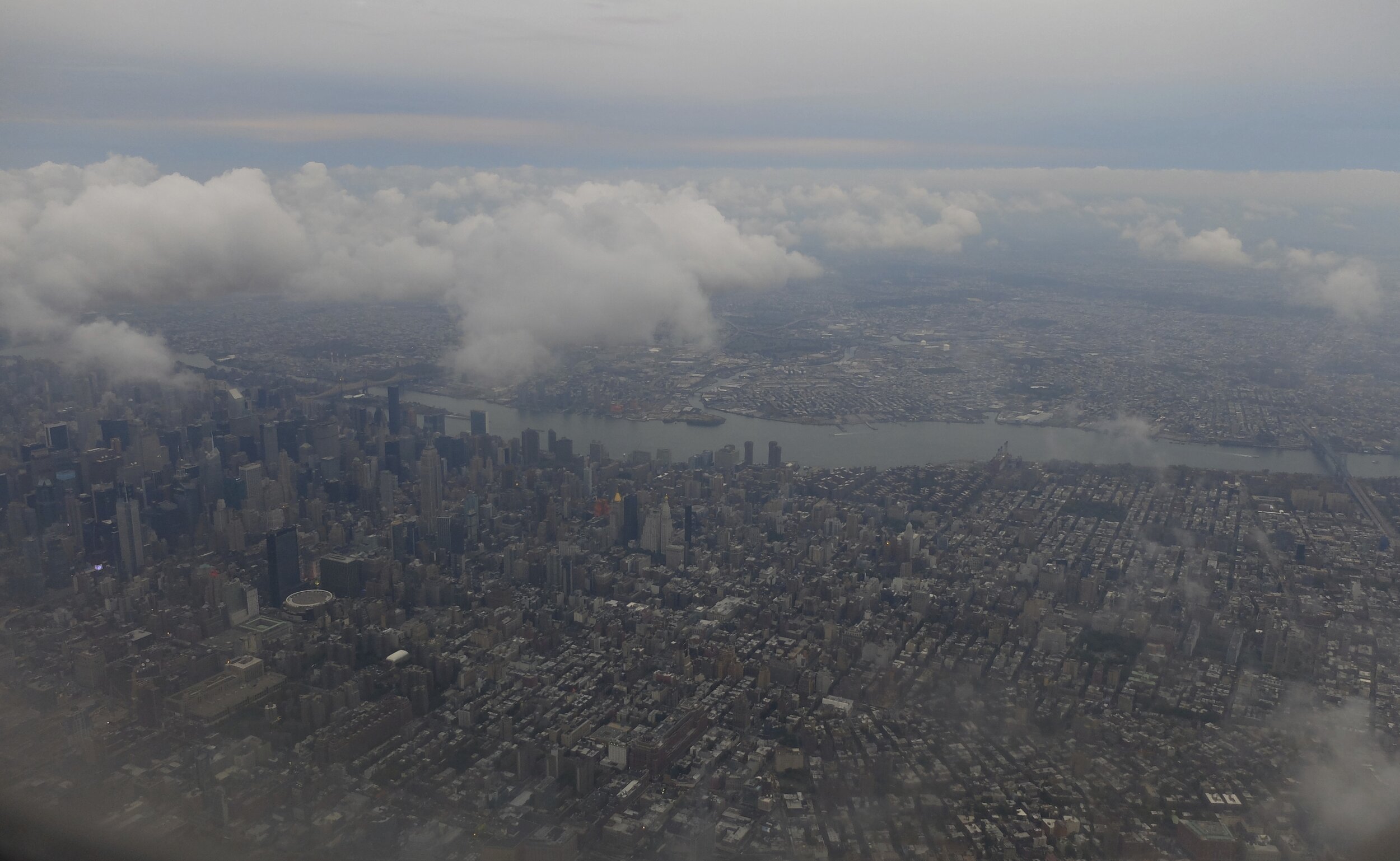 And in Oct. 2013, from the approach to LaGuardia airport.  The cloud, over the East River, is pointing to the U.N. Bldg. &amp; to the left, 432 Park Ave.