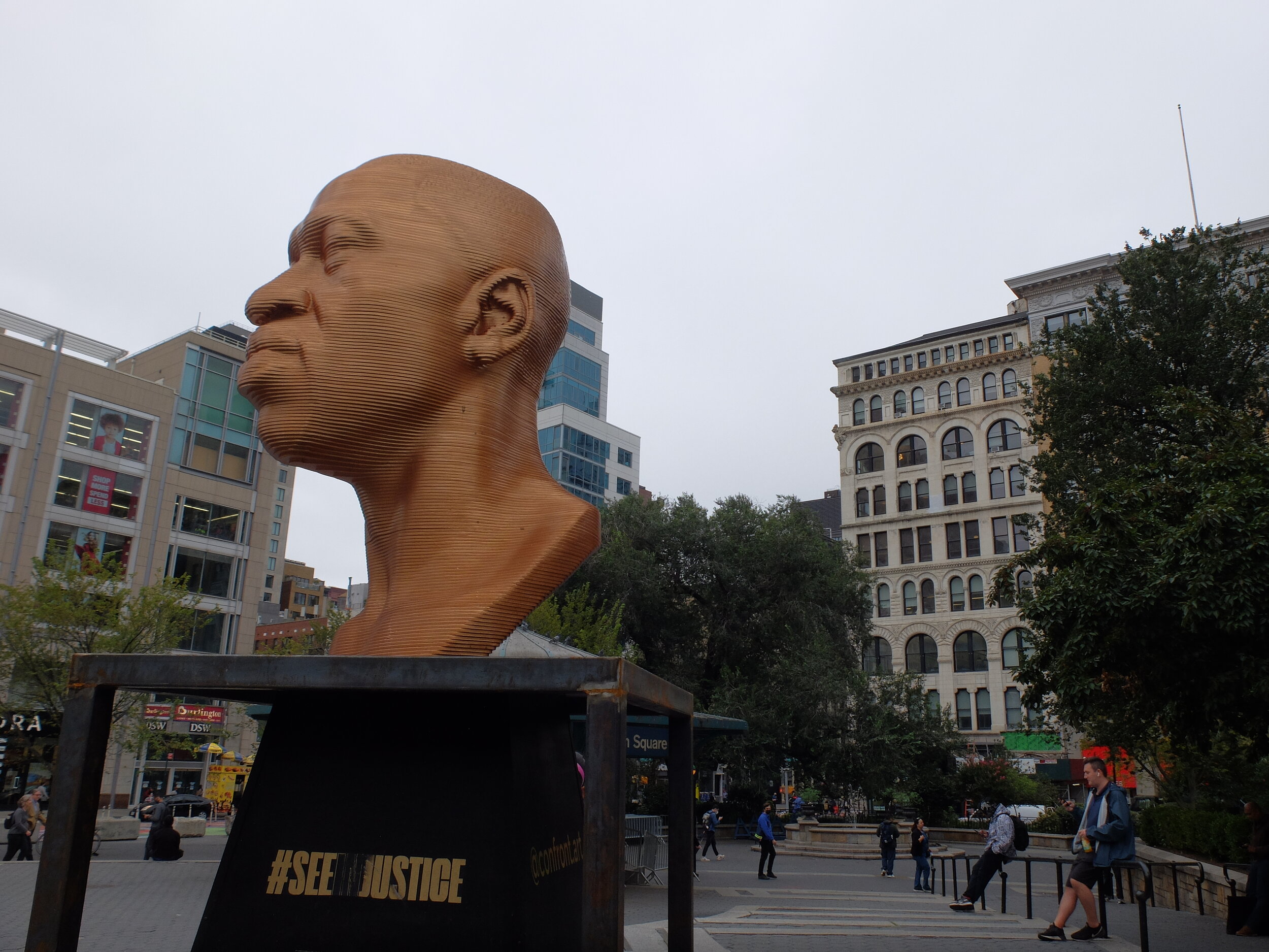 The day before George Floyd's bust had been vsndalized with grey paint.  It  had been cleaned overnight