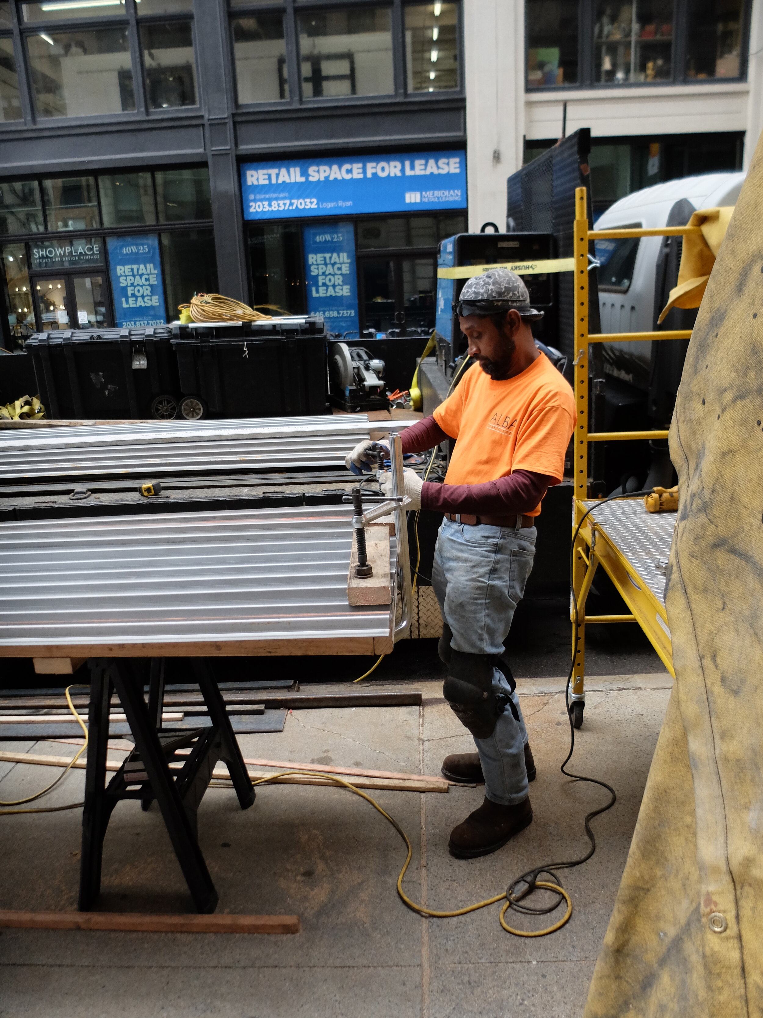 This guy was putting together siding for a small business lobby.