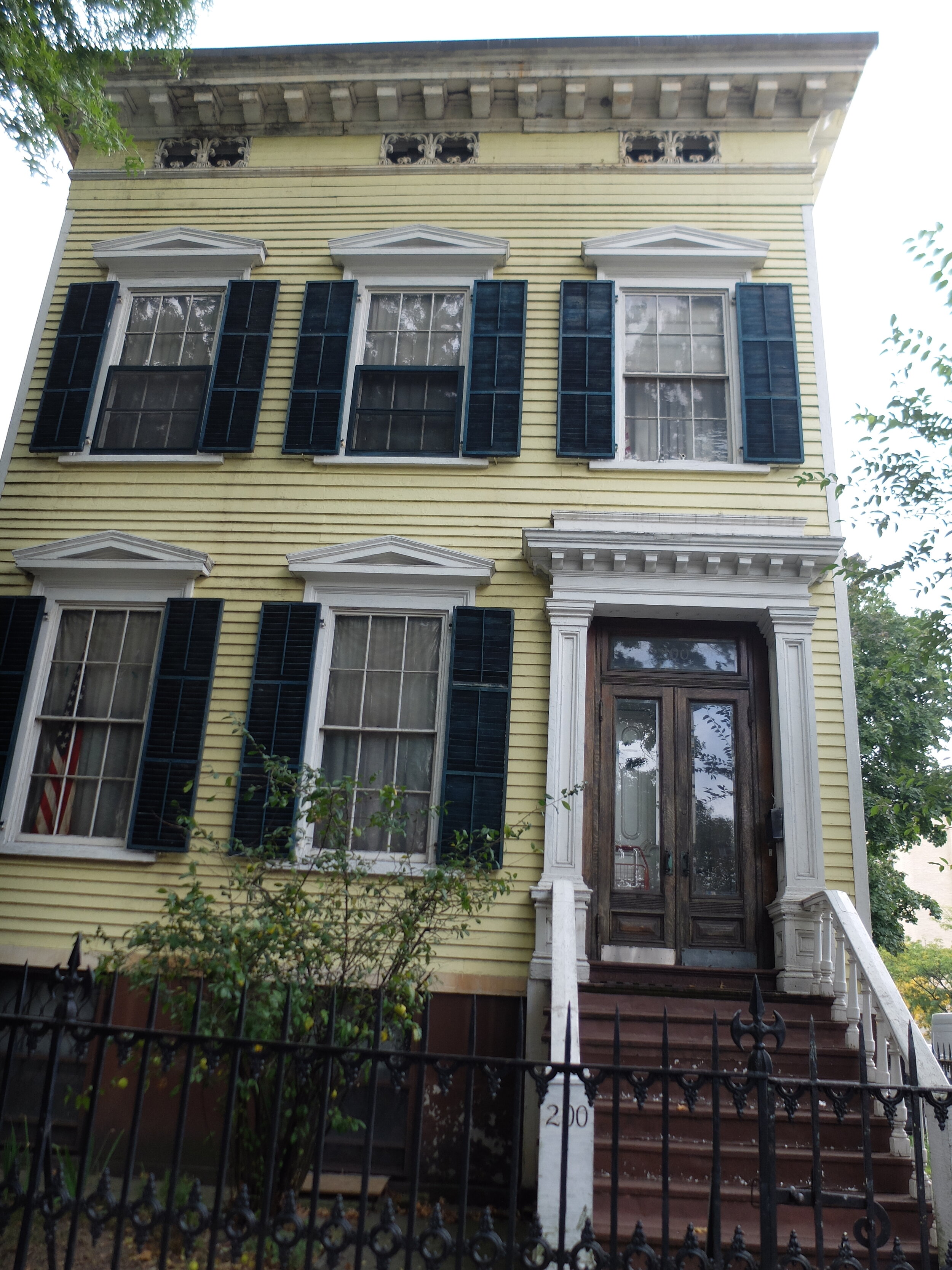"The  c. 1 840's Joseph Steele house is a survivor from when the area was still farms and suburban villas. One could once see the harbor from the widow’s walk and cupola."