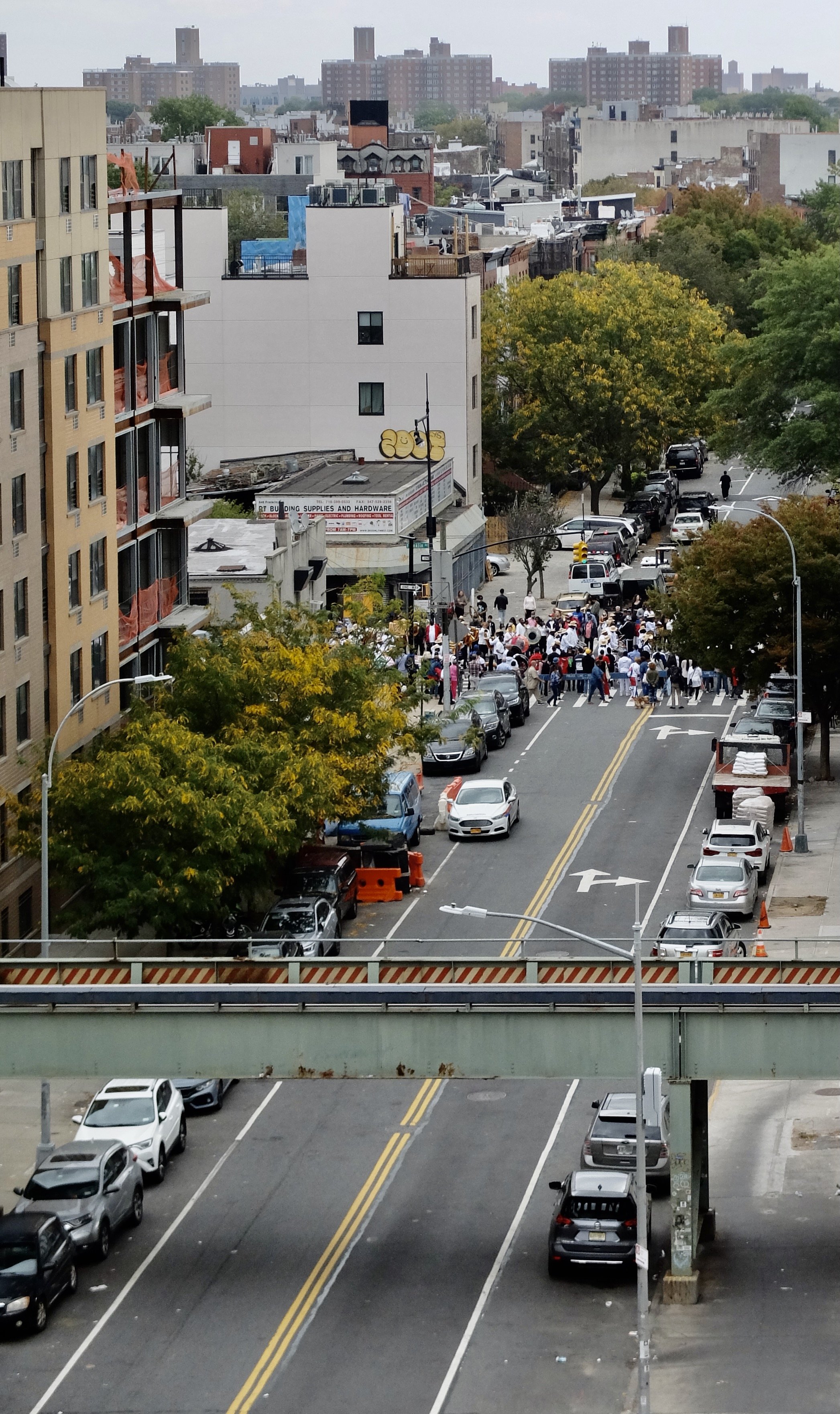 Panama Day Parade on Franklin Ave. seen from our apartment.  Nomi met Ms. Panama in one of the bodegas.