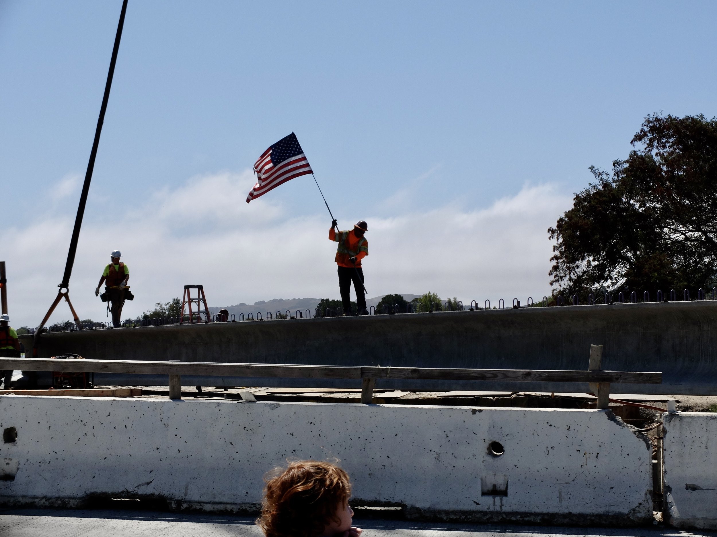 ...just as they were installing the final girder of the span.