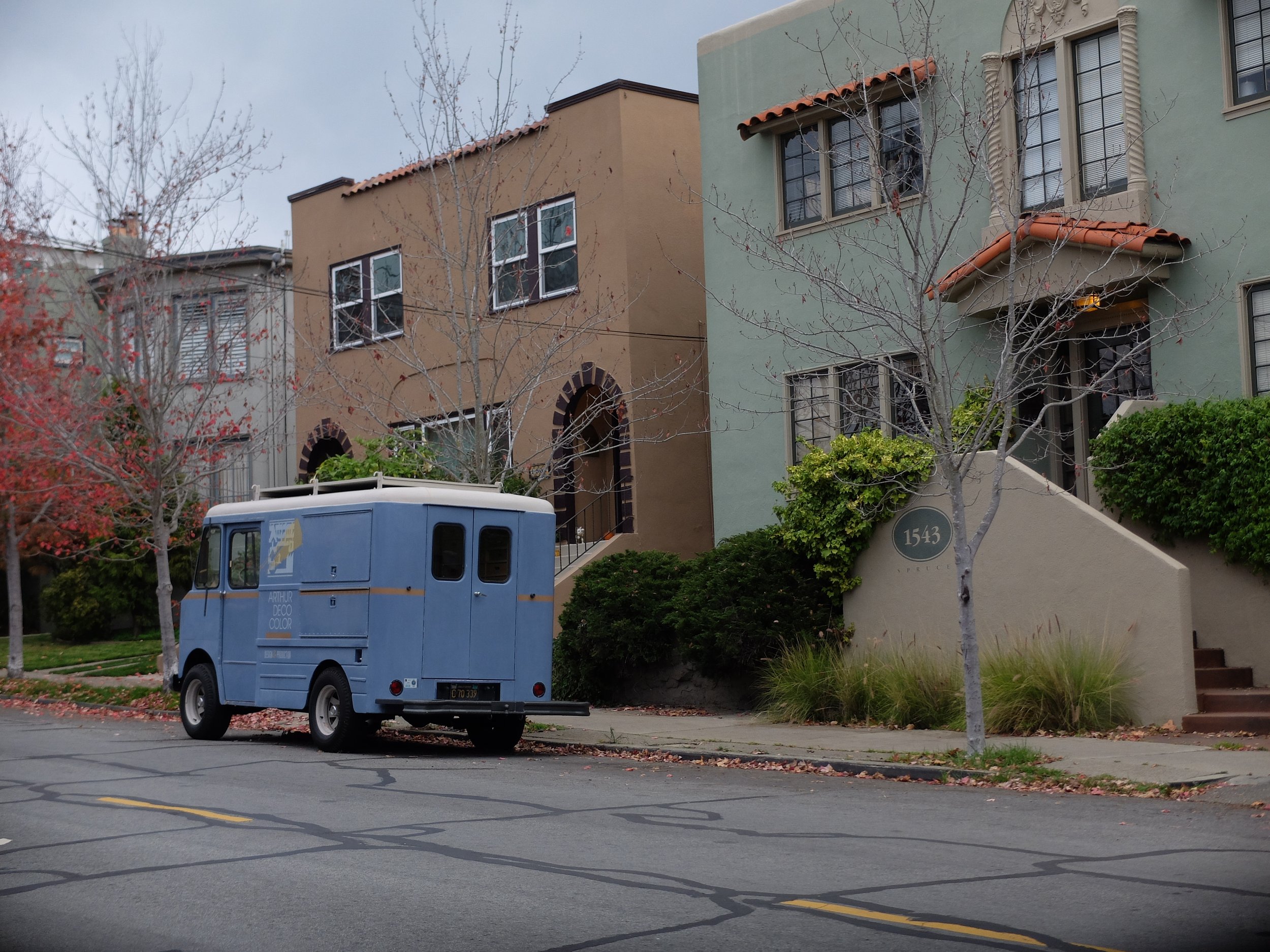 I noticed this truck/van down the street.  I thought it looked vintage &amp; perhaps British or maybe a milk delivery van in a former life. 