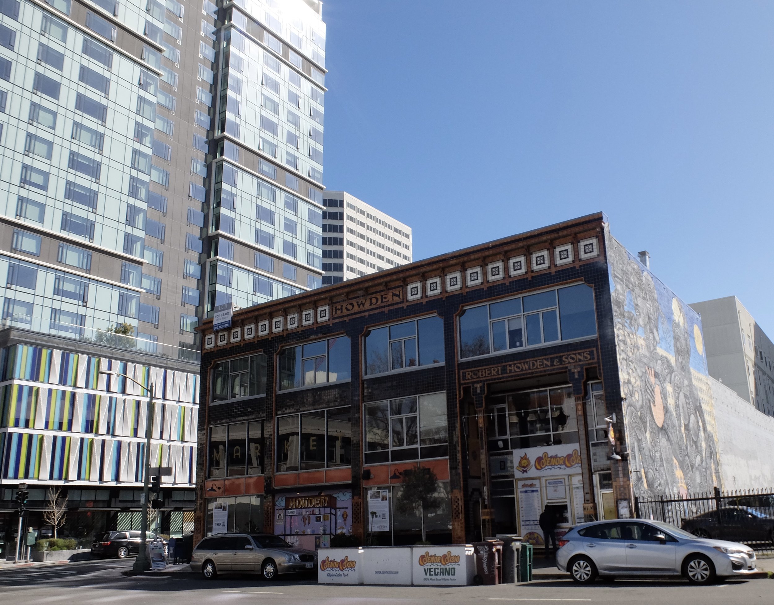  While bicycling recently, one of the folks mentioned the beautifully tiled Howden Market building in downtown Oakland.  We were headed in that direction so we set Google maps for the building at 18th &amp; Webster Streets. 