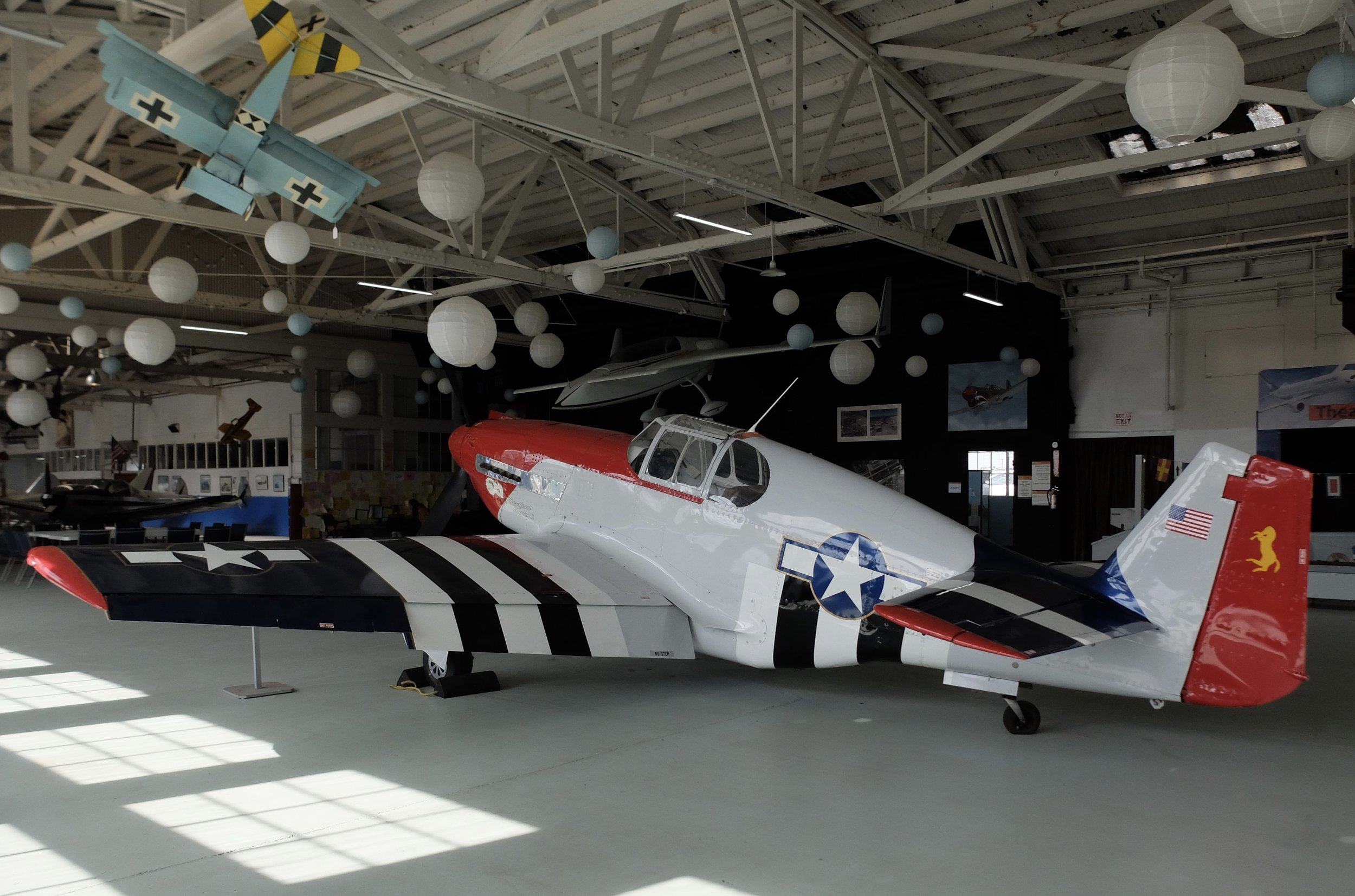  The N. American Aviation P-51 Mustang was an American long-range single-seat fighter aircraft.  The plane was famously used by the Tuskegee airmen. 