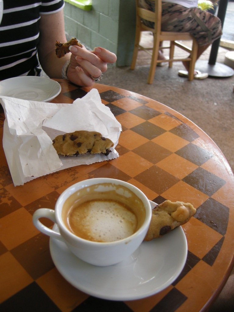 Coffee &amp; a macademia nut chocolate chip cookie.  Divine! 