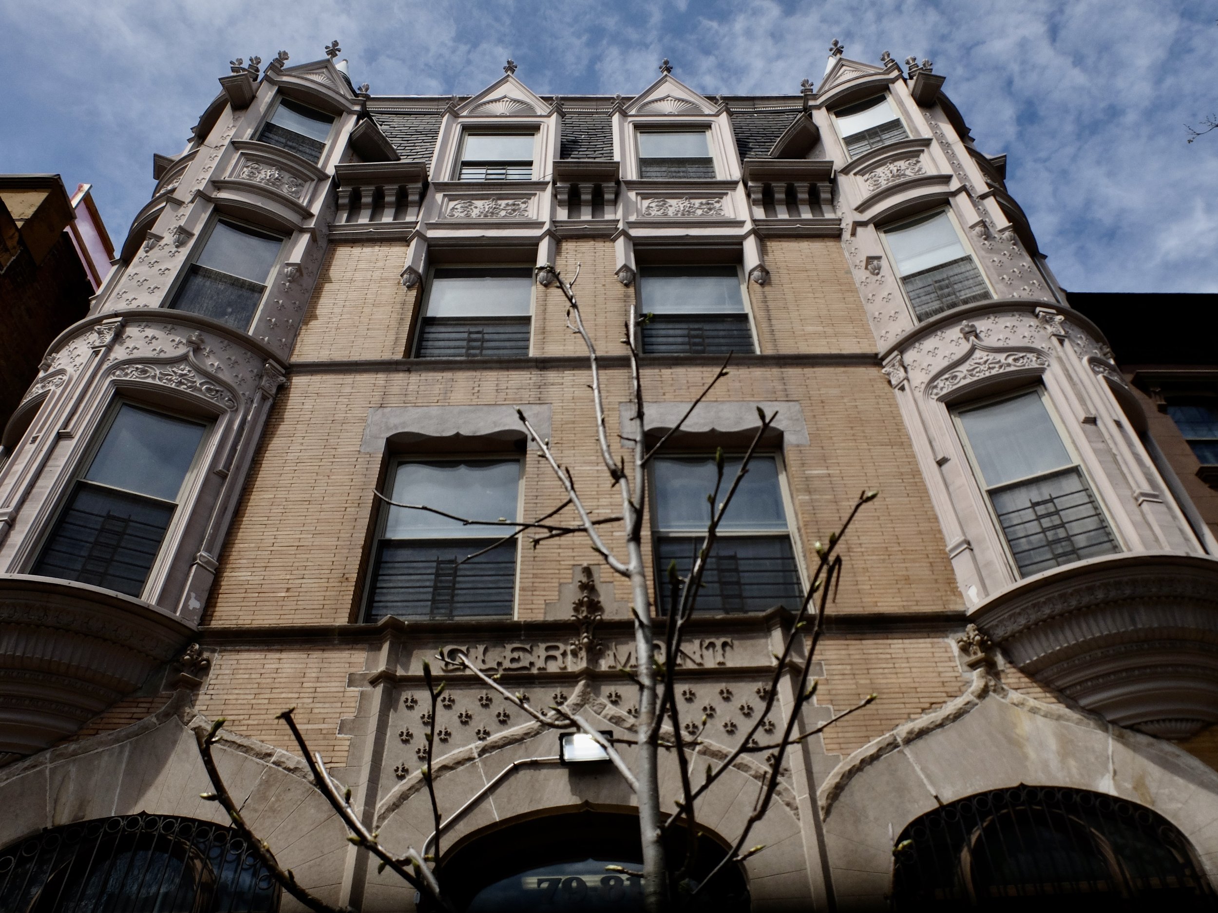  The multiple dwellings in NYC were tenements. In this grandiose structure there are two apartments on each floor.  It was made palatable for upscale folks to move into an apartment.  This architect was very prolific. 