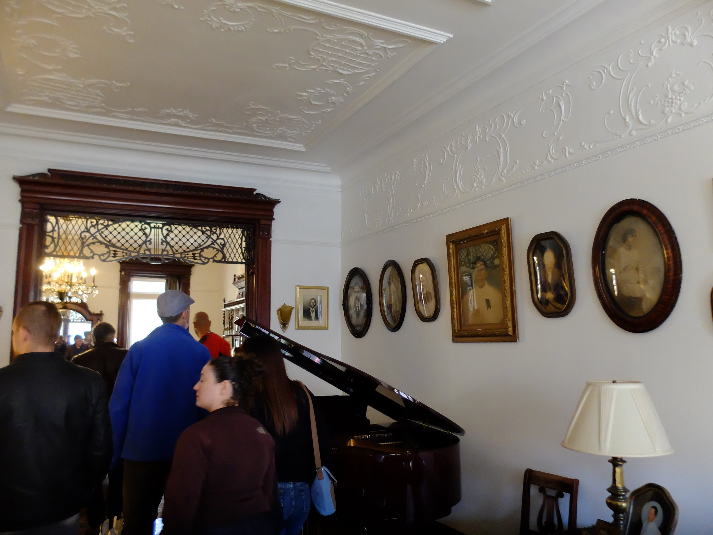  Morgan was kind enough to take us into his brownstone.  Those are family photos.   The large one is of an ancestor who had 17 children.  The piano was his mother's from when she worked in a funeral home. 