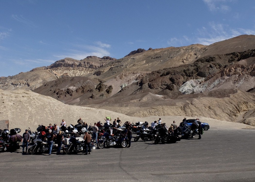  These delightful folks from Quebec, who surrounded Miles, had trucked their bikes to Las Vegas to start their group adventure.  Mais oui. 