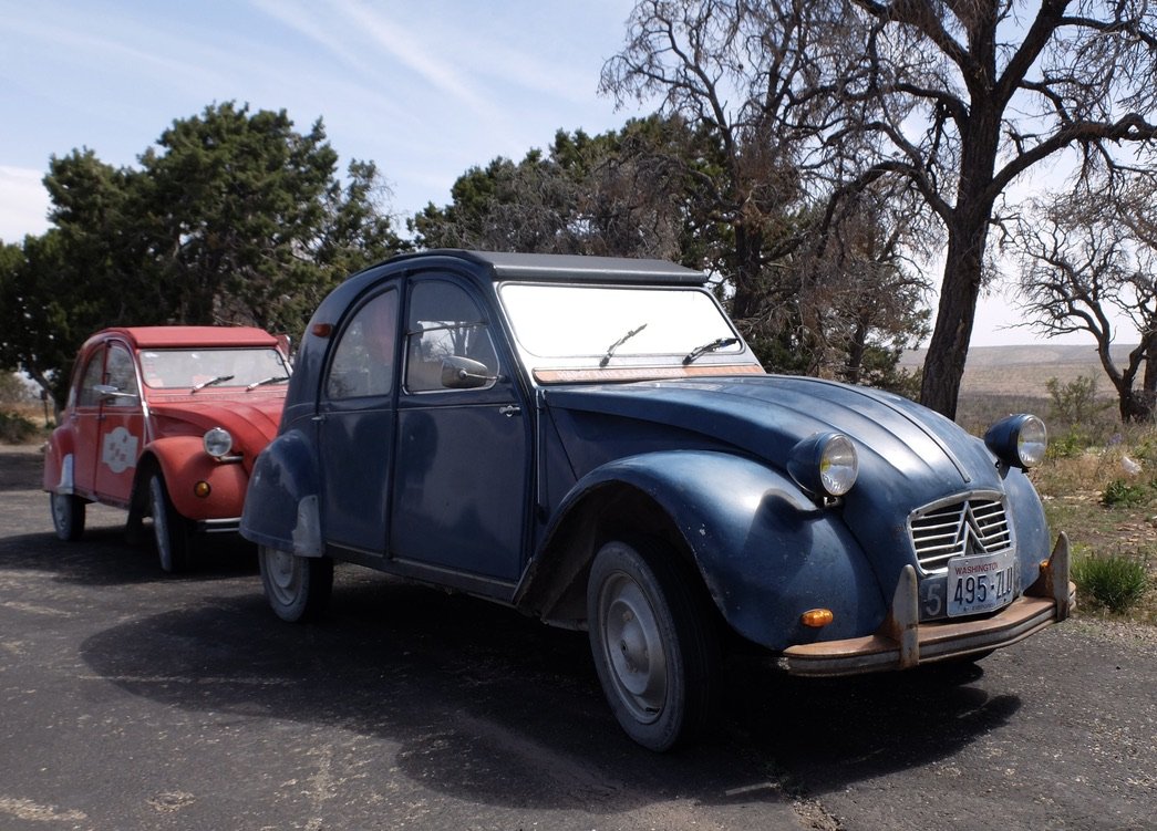 Somewhere along Scenic Byway 87 or 64 we stopped at a scenic overlook &amp; Nomi said, "Oh look, vintage Citroens!" They had driven from Washington State &amp; could fix anything on these cars.