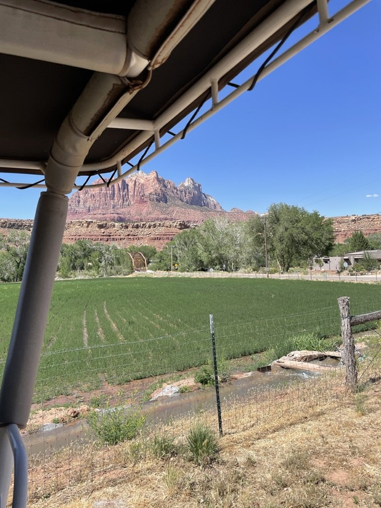  At 3:30, we took the Jeep tour. (Zion Jeep Tour Premium Package). Murphy described how this property owner has much coveted water rights.  Note the 100 year old iron truss bridge in the background. 