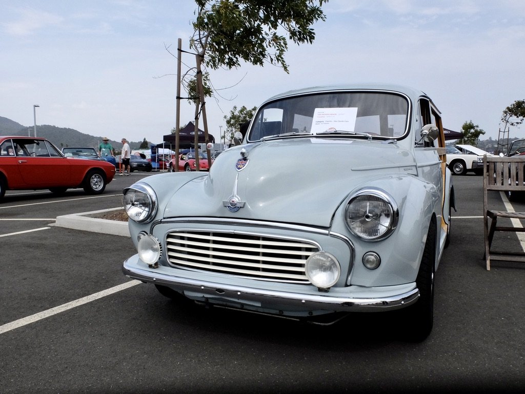 The owner of this beautifully restored  1960 Morris Minor 1000 Travellor Woodie had owned several roadsters before this.  Ed wanted a vintage auto that would accomodate his family.