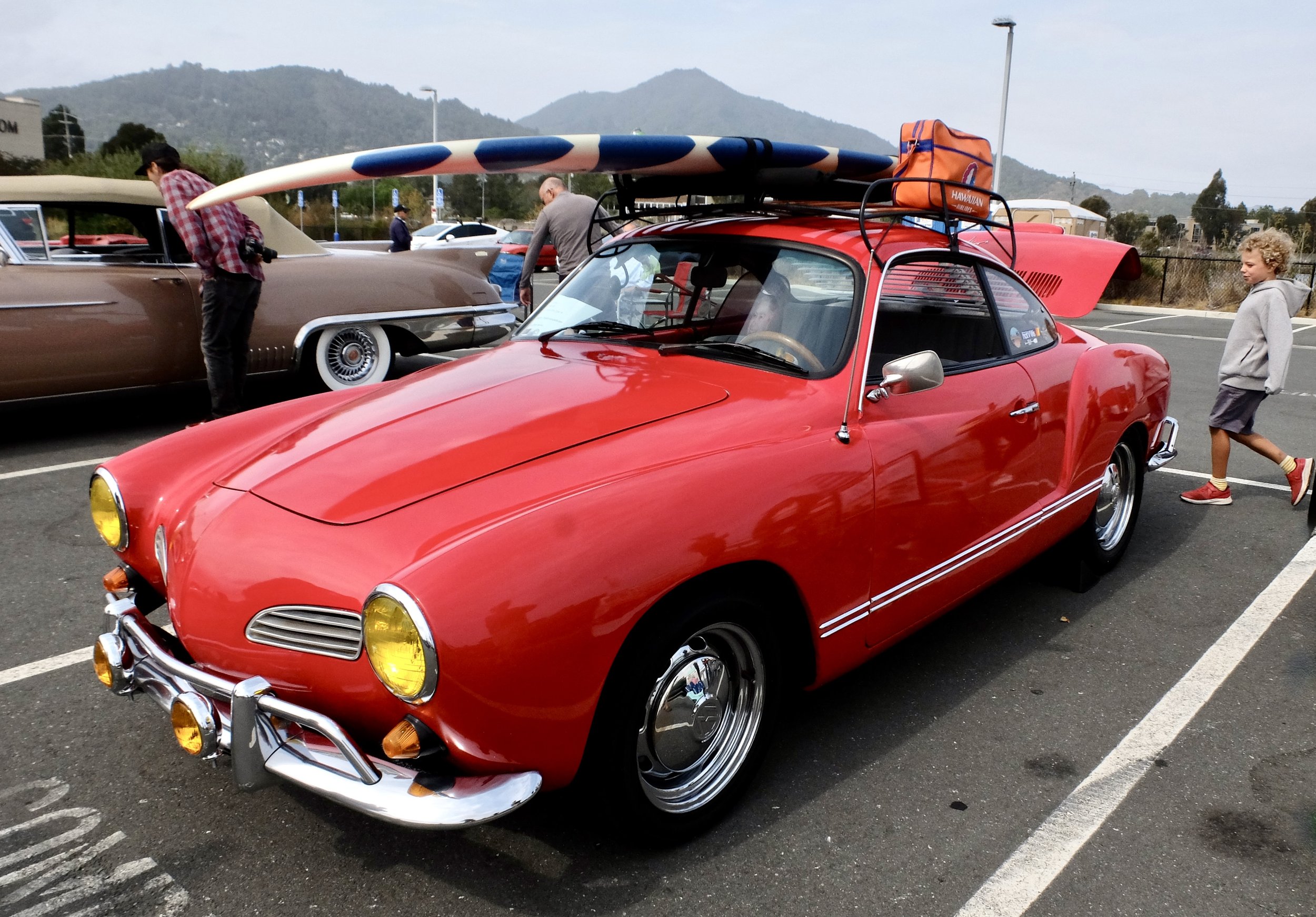 We once had a Karmann Ghia.  It was a 1974 Saturn Yellow roadster.  It wasn't tricked out like this Ghia.