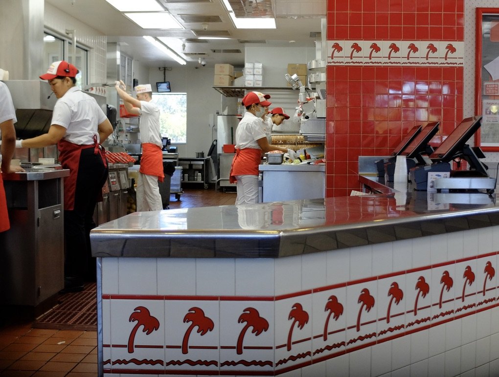  Later, we stopped at another In &amp; Out Burger, this time it was for a lunch break. I got the well done fries.  Perfecto.  The guy on the back left is likely getting repetitive strain injury to his elbow from cutting spud after spud. 