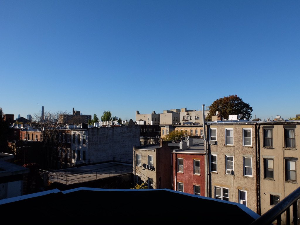 The expansive view from the 2nd floor deck, goes from downtown Brooklyn (the Brooklyn Tower) to Midtown Manhattan (432 Park Ave.).