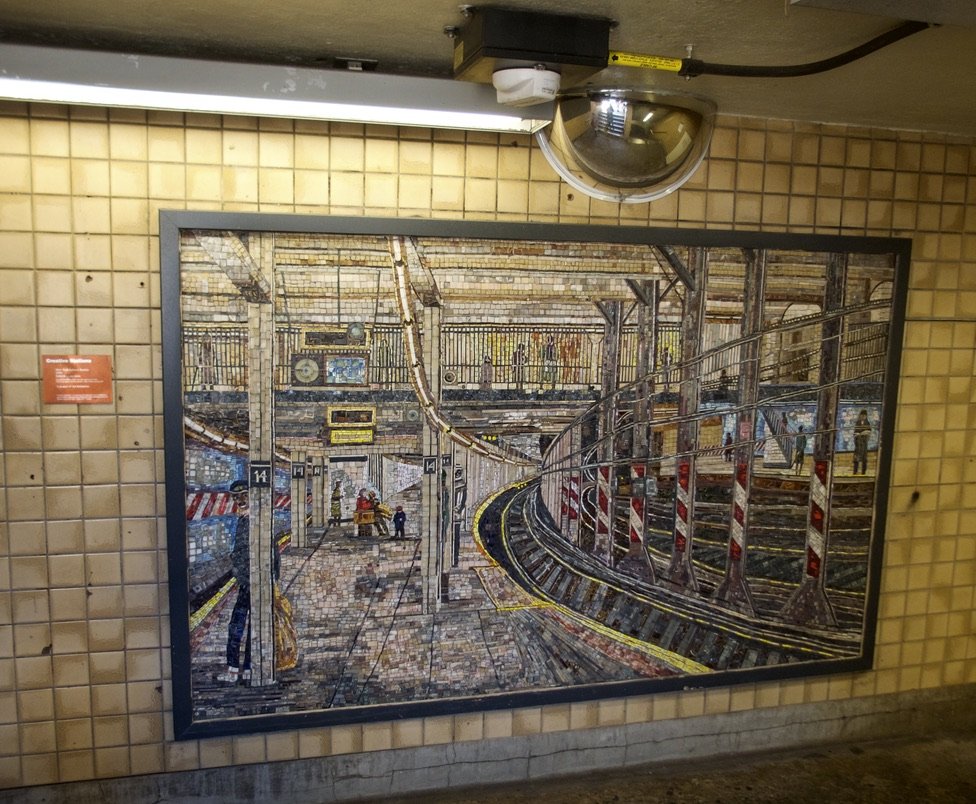  In the stairwell of the Spring St. Station - “ New York Subway Station  1994 by Edith Kramer - Handmade by the artist over the course of a year…glass, marble, slate, brick, ceramic tile." - This mosaic looks like the Union Sq. subway station. 