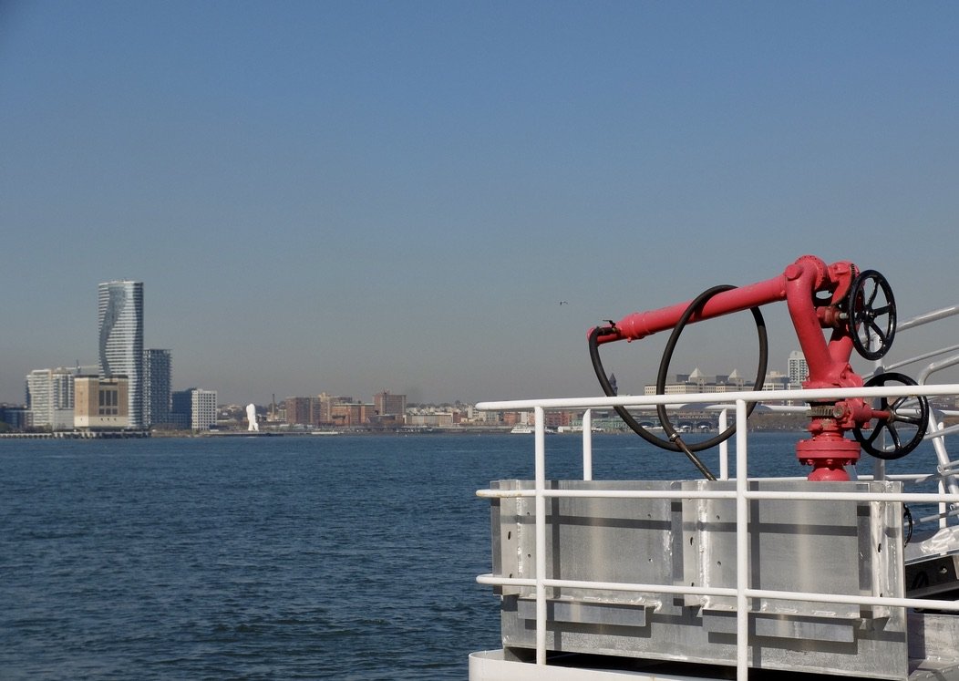  Across the river, Jersey City waterfront's 80-foot-tall sculpture called  Water's Soul  by Jaume Plensa.   