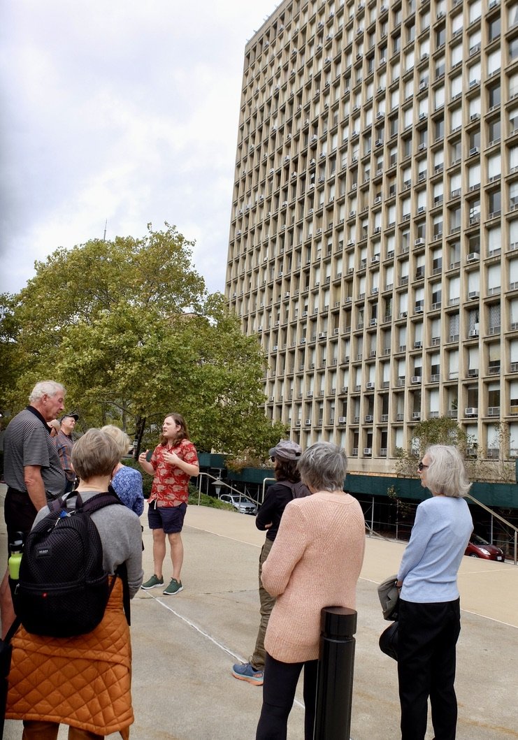 MAS Zack Rhodes' tour of Kips Bay/Murray Hill neighborhoods. Behind him is the Kips Bay Towers. A two-building condominium complex in the brutalist style by I.M. Pei c. 1965