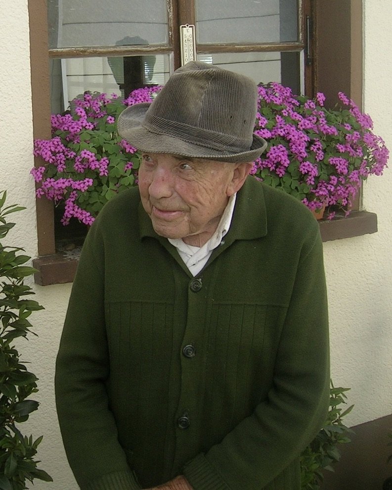  Some posed cheerfully after engaging.  He was over 90 years old, didn’t speak English but loved meeting us.  Somewhere along the Mosel River, Germany (GR). 