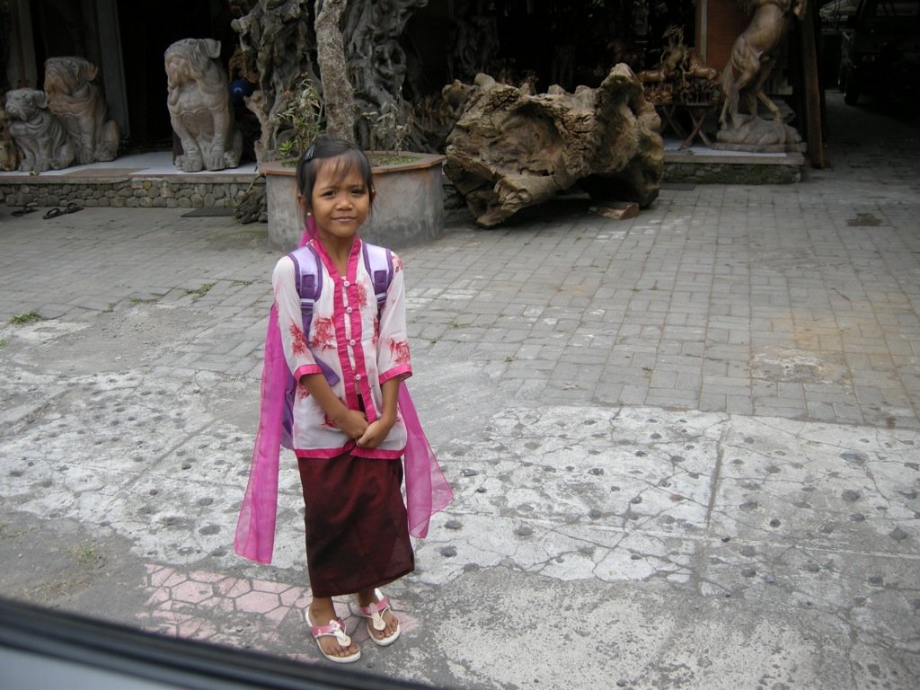  Some  were happy to have their photograph taken.  Special school outfit for full moon - Bali, Indonesia. 