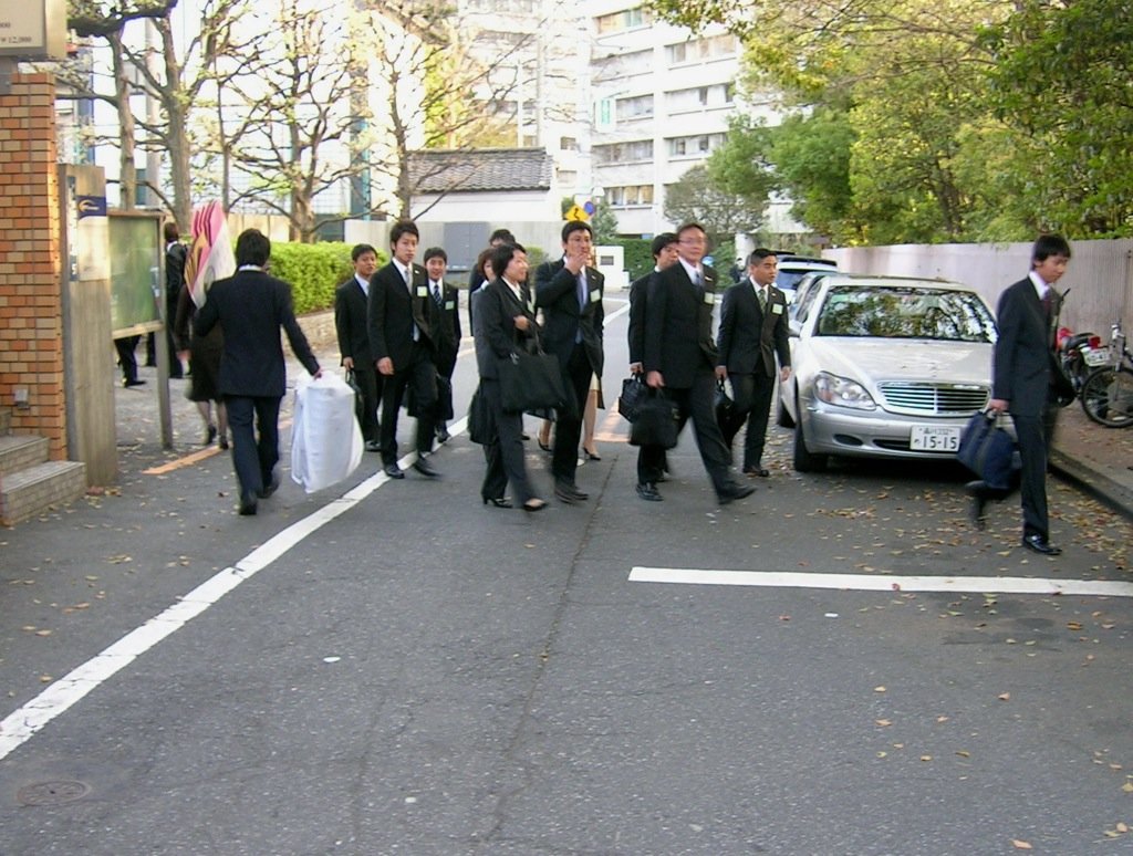 Tokyo, Japan.  April 1st is the 1st day of work &amp; school.  These are probably new employees about to start their jobs.   